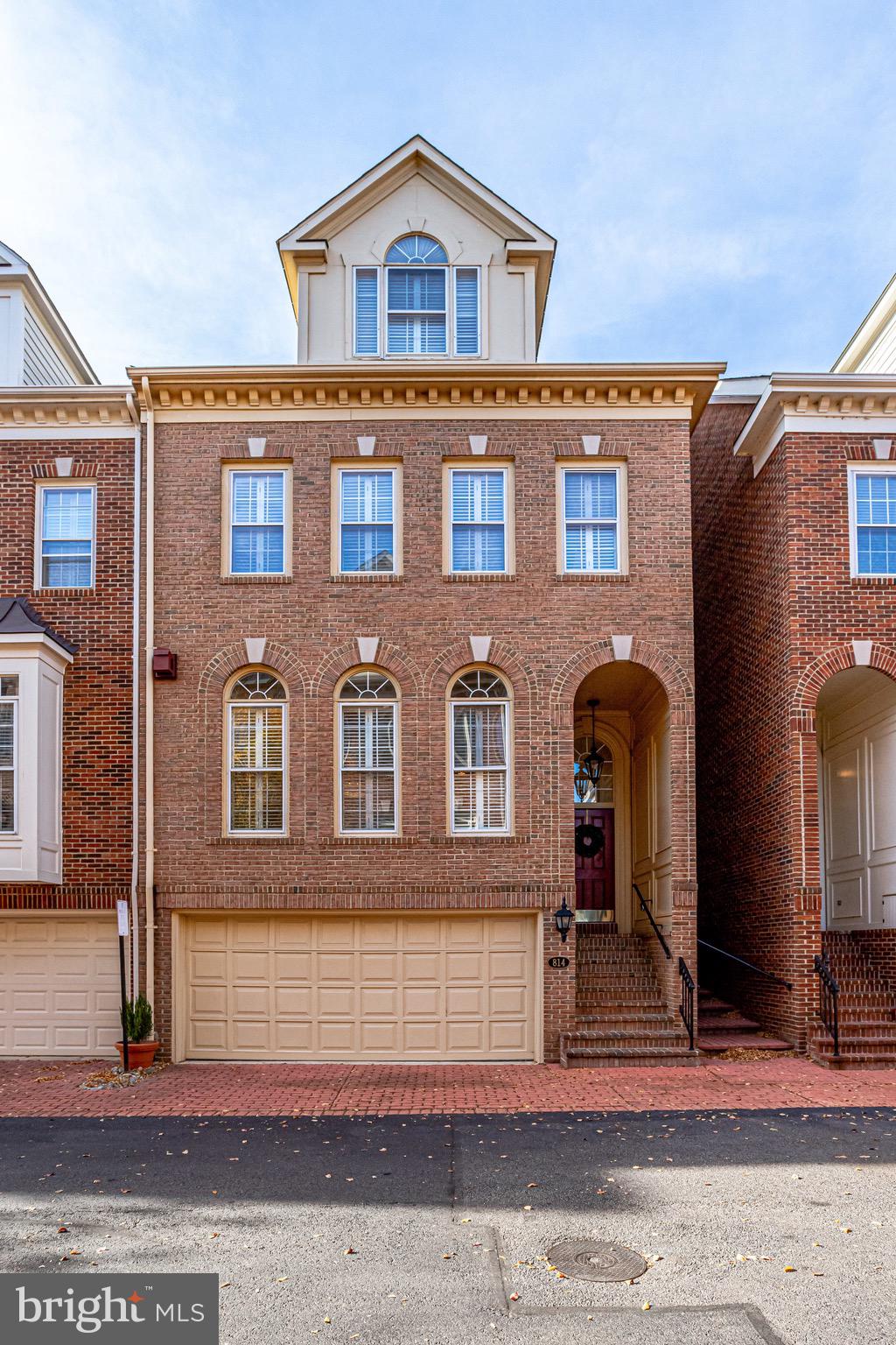 Step out your front door enjoy a glorious sunrise over the Potomac River!    This  superior 3 bedroom, 3 and one half bathroom  brick  townhome has been meticulously maintained in the coveted riverfront neighborhood of Rivergate.   The oversized  flagstone patio with a brand new cedar fence with your own private entrance, gas line hook up for the griller in your family is perfect for dining and entertaining outside.  Other features include an eat-in kitchen,  crown moulding, two car garage with epoxy coating, a cedar lined storage closet and a bonus room on the fourth floor.  It gets better!  Rest in your own personal sauna and after using the flexible spaces for your home gym and work from home offices.   Glimpses of the water from the top three levels of the home. the location cannot be beat!   Walk to King Street,  shops and  restaurants  in bustling Old Town North.  Go for a jog or walk your dog in one of three parks that surround the community; Rivergate Park, Tide Lock Park and Oronoco Bay Park,  with trails and a sand volleyball court, this location cannot be beat!!