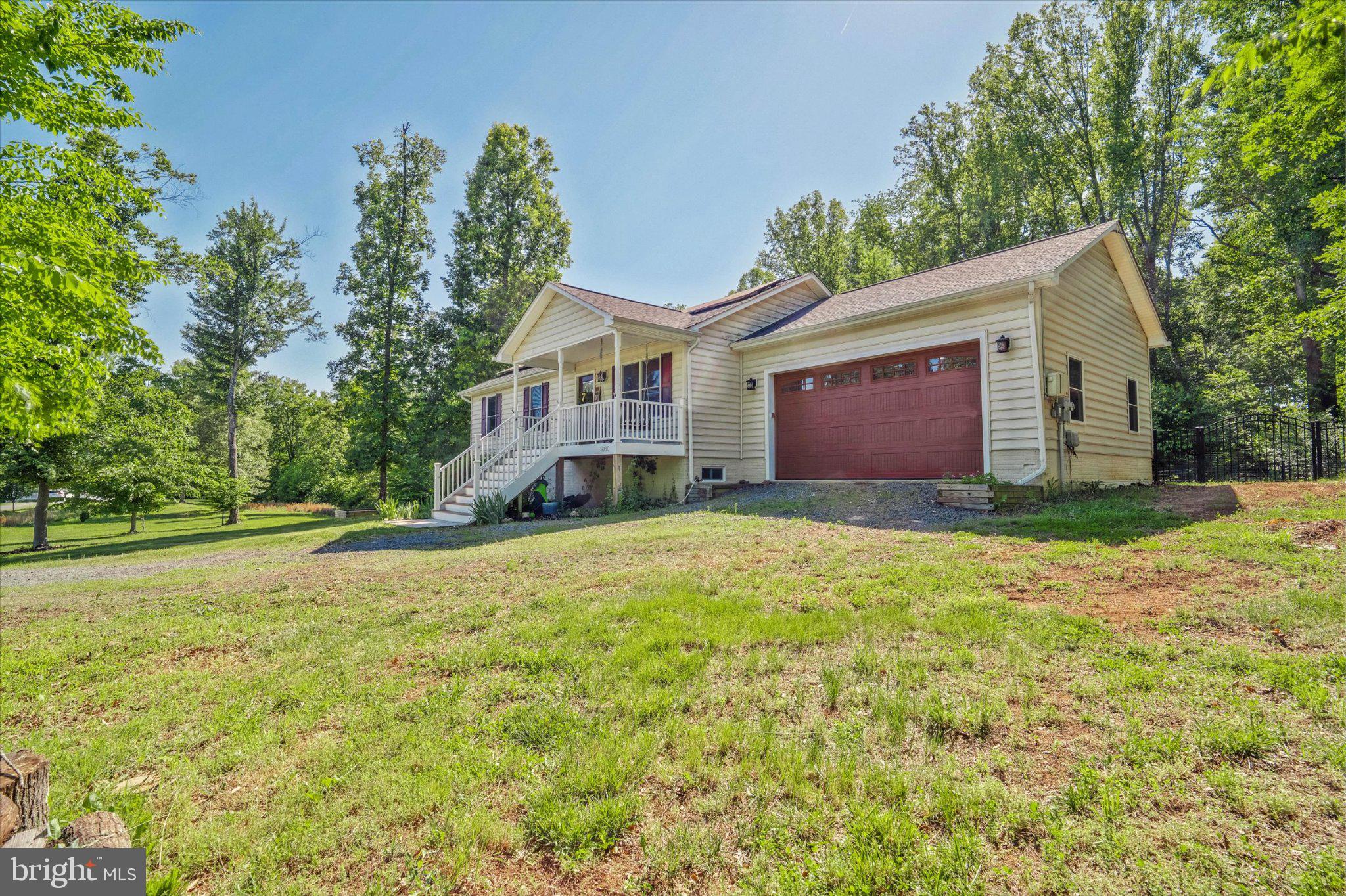 Ideally located just five miles from Warrenton on a peaceful 2+ acre cul-de-sac lot, this move-in-ready 3BR/2BA rambler perfectly balances rural tranquility with modern innovation. The main level offers 1,120 finished sq. ft. of open-concept living, featuring vaulted ceilings, wood floors, a chef's kitchen with granite countertops, and premium finishes throughout. A matching 1,120 sq. ft. unfinished walk-out basement provides incredible growth potential. Fully optimized for energy efficiency, the property boasts a 6.6kW solar power system that has covered all electrical consumption from April–October for the past five years, alongside high-efficiency windows, top-tier insulation, and Nest® thermostats. The exterior features an attached 2-car garage with an EV outlet and raised beds with a rainwater collection system—all with no HOA restrictions. High-speed 1000 Mbps internet available.