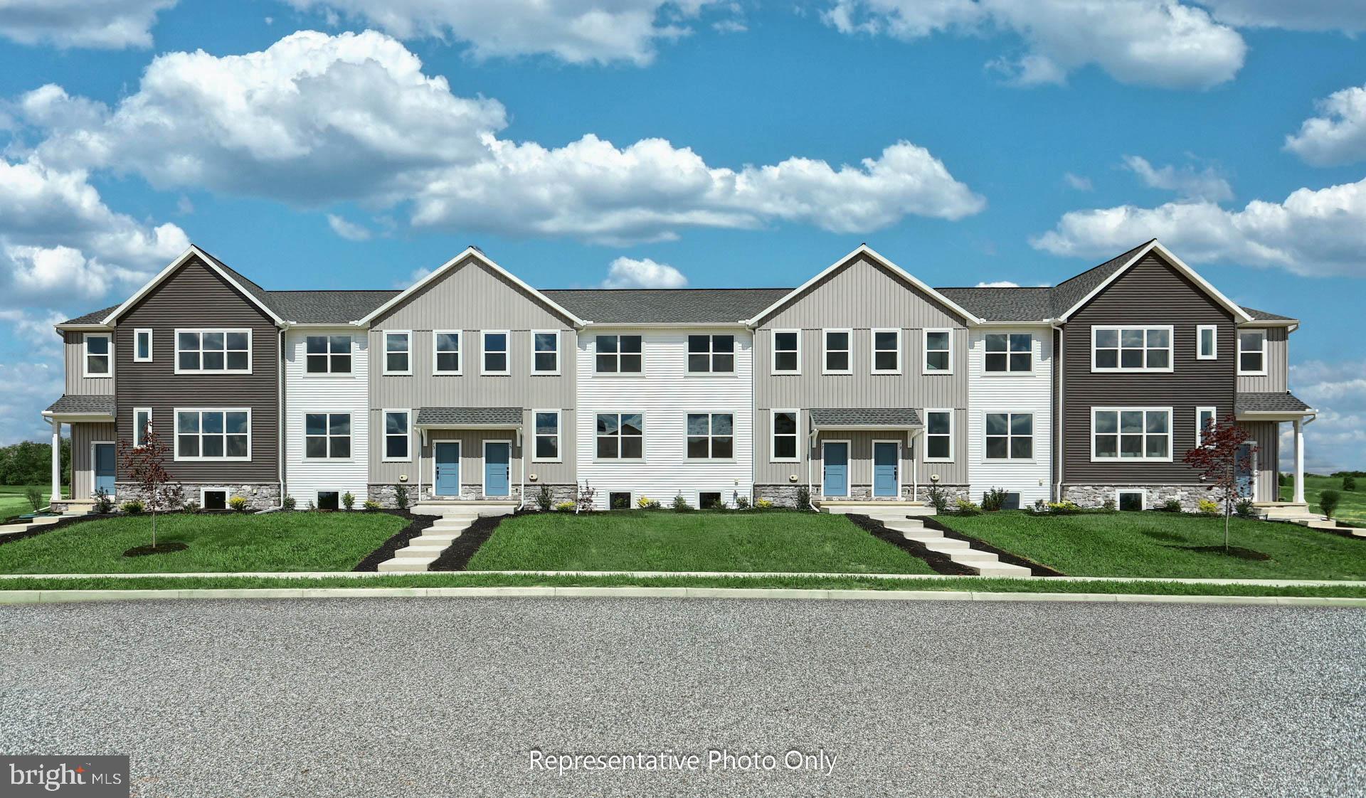 This comfortable 2-story townhome includes a 1-car, rear load garage and 9’ ceilings on the first floor. Stylish vinyl plank flooring flows throughout the first floor. The sunny family room opens to the kitchen and dining area. The kitchen is well-appointed with stainless steel appliances and quartz countertops. On the second floor, the owner’s suite features an expansive closet and a private bathroom. Adjacent to the suite are two additional bedrooms, a full bathroom, laundry closet, and loft.