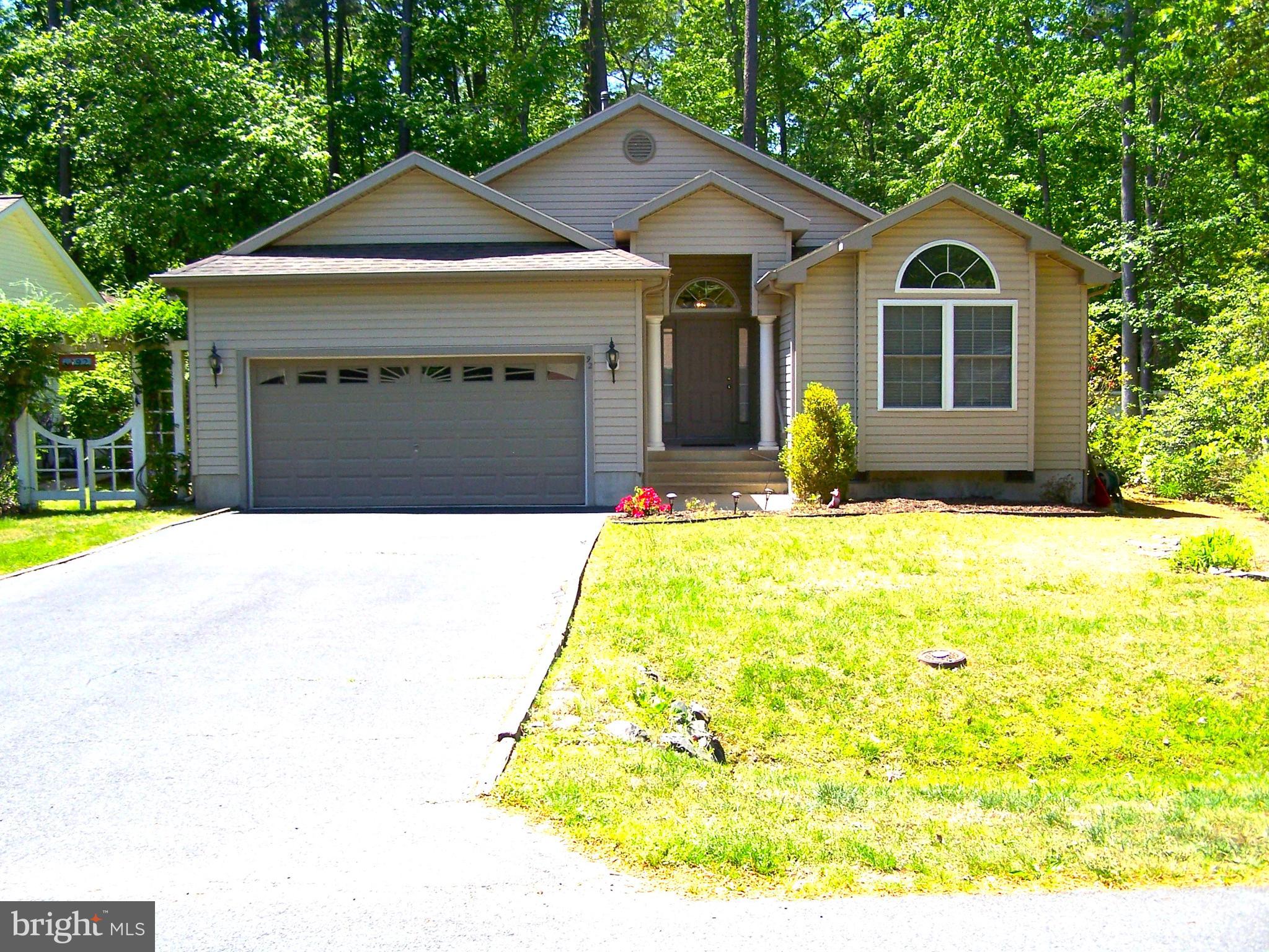 Discover the charm of this delightful ranch-style home, nestled on a spacious 0.22-acre lot. Built in 2001, this well-maintained residence offers 2,054 sq. ft. of inviting living space, perfect for creating lasting memories. With three large bedrooms and two full bathrooms, there's ample room for relaxation and comfort. Step inside to find a warm ambiance highlighted by cathedral ceilings throughout, skylights in living area, custom cabinetry, granite counters, and a gas fireplace, ideal for cozy evenings. Outside you will find a spacious patio area, a large deck overlooking your private back yard, and an enclosed porch off of the master bedroom...perfect for enjoying your morning coffee. Enjoy the convenience of an asphalt driveway with space for up to four vehicles. Not too far away, a community pool awaits for those sunny days, providing a refreshing escape. The surrounding neighborhood offers a welcoming atmosphere, perfect for leisurely strolls or enjoying the outdoors. This home is not just a place to live; it's a place to thrive. Embrace the lifestyle you've been dreaming of! Call now to schedule your private showing.