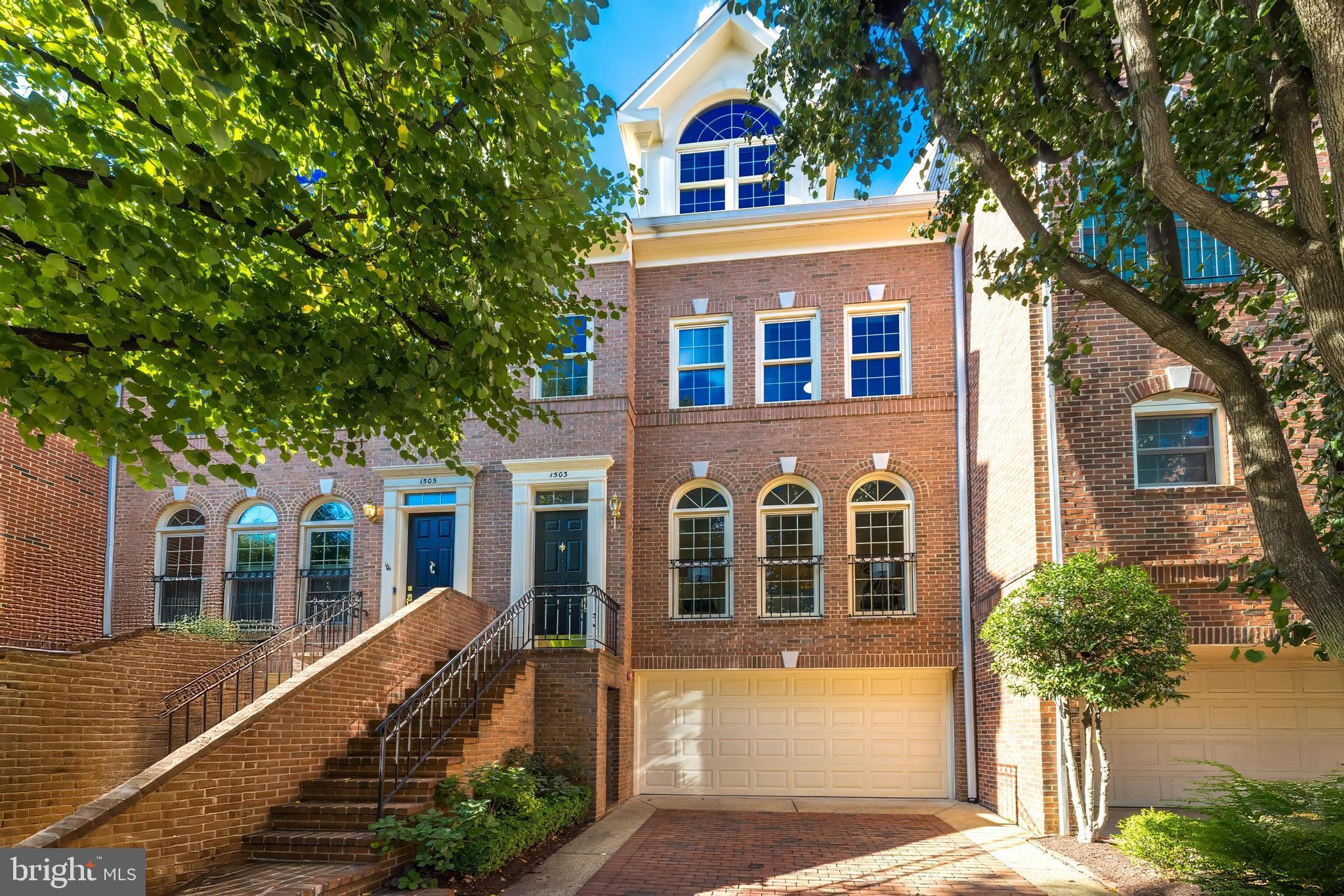 Absolutely turnkey and fully updated​,​ this stunning 4-bedroom, 5-bathroom (3 full, 2 half) home in the highly desirable Highgate community has been comprehensively improved inside and out in recent years. Major updates include all-new energy-efficient windows (2024), two new HVAC systems (2023 & 2025), new roof & gutters, new hardwood floors on upper levels (2023), refreshed bathrooms (2025), and a Tesla Level-2 charger — ensuring comfort, efficiency, and peace of mind for years to come.  With nearly 3,000 sq ft, this is one of the largest homes in the neighborhood, offering generously sized, light-filled rooms with soaring ceilings. The updated eat-in kitchen (2020) combines timeless style with modern functionality, featuring custom gray wood cabinetry, white quartz countertops, herringbone backsplash, stainless steel appliances (including double wall ovens and gas cooktop), and chic lighting. The main level’s open living and dining areas flow seamlessly for entertaining and showcase gleaming hardwood floors.  The primary suite is a spacious retreat with a huge walk-in closet, an additional wall closet, and a luxurious spa-like bathroom (2021) boasting a freestanding soaking tub, oversized glass shower, double vanity, and private water closet. The top floor offers two large bedrooms with vaulted ceilings and oversized closets, sharing a fully updated bath (2025) — perfect for guests, home offices, or a fitness area.  The fully above-grade lower level provides a light-filled recreation room with fireplace, powder room, and direct access to both the 2-car garage and the landscaped private patio with recently expanded pavers — ideal for outdoor dining or a peaceful escape.
Additional highlights include a laundry room with new washer (2021), fresh exterior paint, and a private Colonial Court setting with no public street parking — a quiet, resident-only street.  Enjoy unbeatable walkability: just 0.3 miles to Rosslyn Metro and less than a mile to downtown Georgetown, with quick access to world-class dining, boutique shopping, scenic riverfront trails, major commuter routes, and both IAD and DCA airports.  *** MORE PHOTOS AND VIDEO TO COME SOON ***