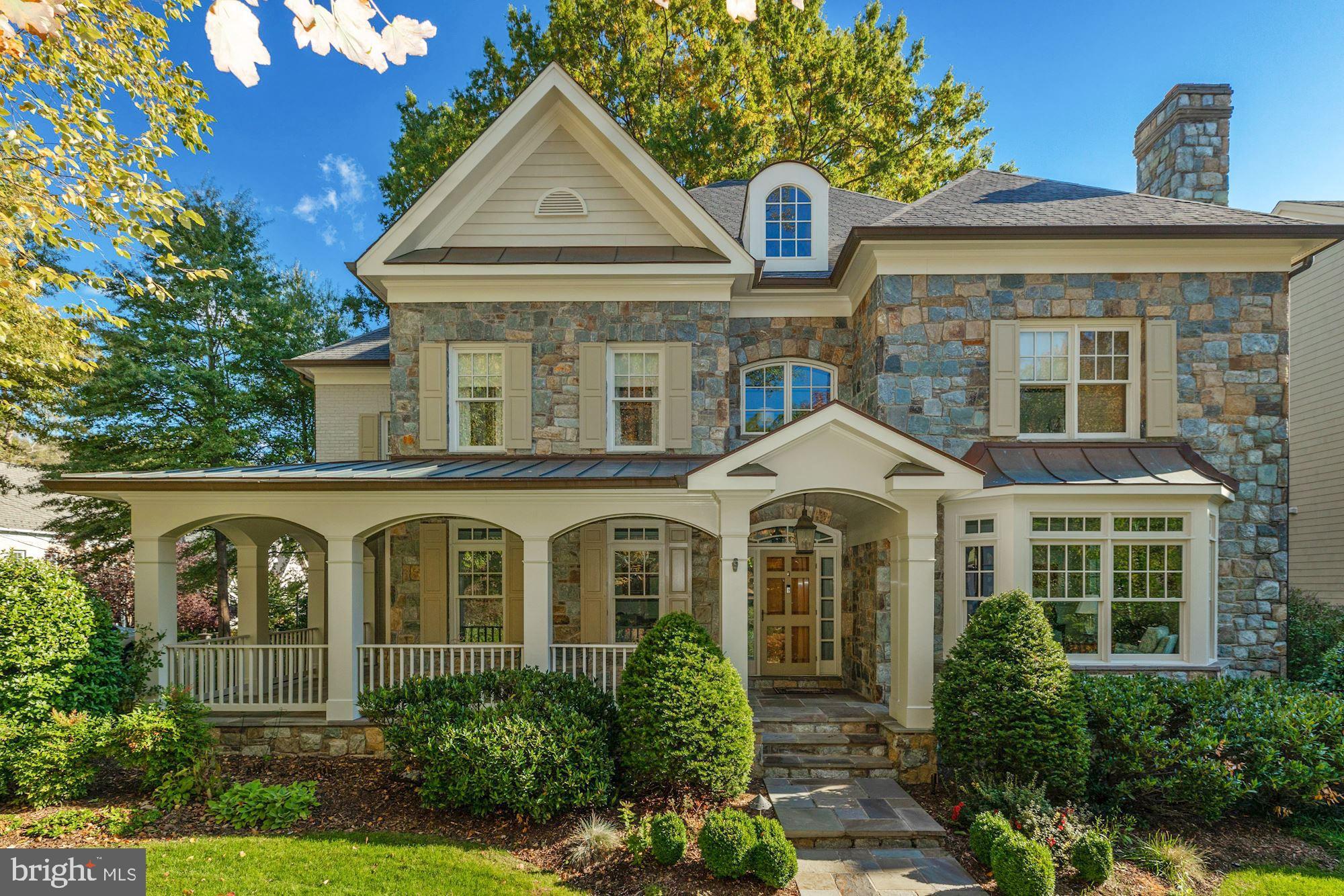 One-of-a-kind, custom-built residence in sought after Country Club Hills! The main house offers five bedrooms, five full/one half bath and a light-filled and spacious floor plan that's ideal for daily family living, as well as entertaining. The main level features a living room with a fireplace, formal dining room with butler's pantry, study and a large family room opening to the gourmet kitchen and breakfast room overlooking the beautiful backyard.  Additionally on this level, there is a large laundry room with pantry storage and a mudroom providing access to the driveway with parking for up to eight cars. Upstairs, the expansive master suite includes a sitting room, dual walk-in closets and a luxurious master bath. Three bedroom suites and a third level finished storage room complete the upper levels. The lower level provides a recreation room opening to a well-appointed wet bar and billiards/game area, a large gym, optional fifth bedroom and a full bath. This level also provides access to the underground tunnel connecting the main home to the three-car garage with a lift and to the guest house. The pool/guest house offers a full kitchen, family room with vaulted ceilings, bedroom, two full baths and a separate floral studio. The picturesque backyard is a true retreat with a screened-in porch, pool, spa, wrought iron fencing, flagstone patios with an outdoor fireplace and hot tub, and gorgeous landscaping throughout that includes a 100+ year old oak tree.