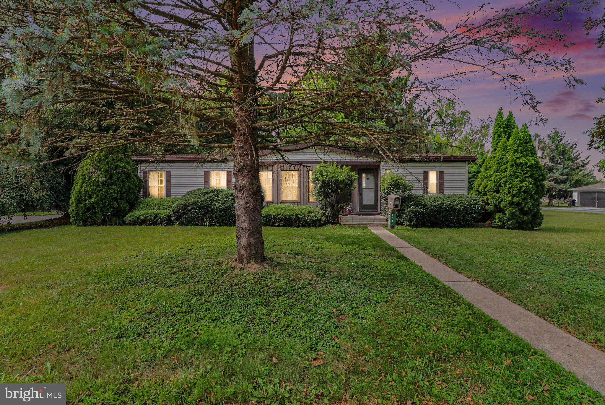 Welcome home to comfort, convenience, and open space! This charming single-level residence offers seamless living on a generous half-acre lot, giving you the perfect blend of easy accessibility and outdoor freedom.  Step inside to an inviting layout designed for effortless living and entertaining. With all living spaces, bedrooms, and daily essentials conveniently located on one main floor, you’ll love the effortless flow and functional floor plan.  The standout feature of this property is the expansive, level yard. Whether you dream of hosting summer barbecues, starting a garden, building an outdoor patio, or simply enjoying peace and privacy, this half-acre lot delivers endless possibilities.