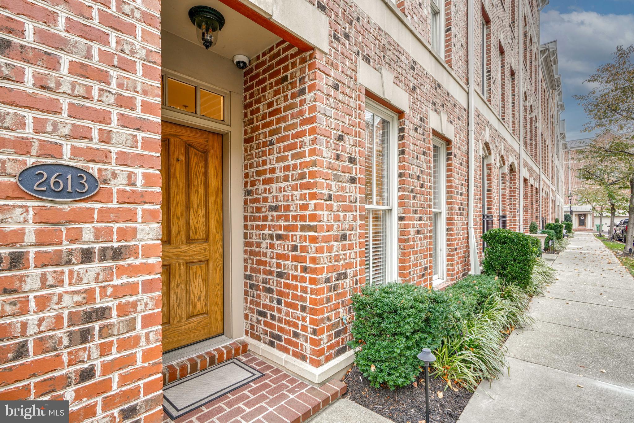 Welcome to this stunning townhouse located at 2613 Lighthouse Ln in Baltimore, MD. This elegant property offers over 2,880 square feet of living space in an ideal location with captivating water views. As you step inside, you'll be greeted by the allure of hardwood floors that flow through the home, as well as countless updates and appealing features. The main level features an open floorplan that is perfect for entertaining, as well as a cozy gas fireplace that creates a warm and inviting ambiance. The kitchen is equipped with gorgeous granite countertops, modern appliances, and offers seamless access to the private balcony, perfect for enjoying the tranquil water views. The upper level features two spacious bedrooms with ample closet space, and an updated bathroom. The primary bedroom suite encompasses the entire fourth level of the home and is a serene retreat complete with a large walk-in closet and a beautiful en-suite bathroom that features a luxurious whirlpool tub, and access to a private water-view patio, ideal for relaxation. The dual zoned HVAC units were replaced in 2019 and the water heater was replaced in 2020. The attached garage and additional parking spaces provide convenient options for both residents and visitors. For added security and privacy, the neighborhood is equipped with an electric security gate. In addition to the breathtaking water views, residents can also take advantage of the nearby amenities and outdoor spaces, including access to the promenade and waterfront as well as tons of local restaurants, shops, grocery stores, parks, etc. Come experience the perfect blend of luxury, comfort, and serenity this home offers. Don't miss the opportunity to make this exquisite townhouse your new home!