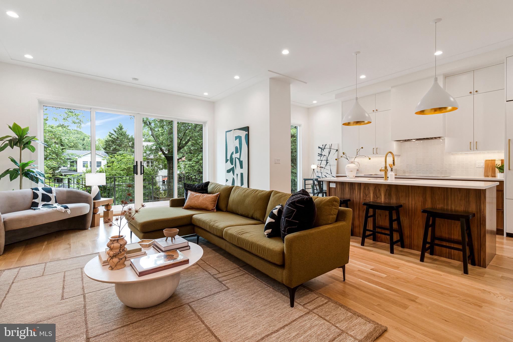 Highest Quality Building and Materials by local firm AllenBuilt.

6 Beds + Bonus Spaces | 4.5 Baths | Two Decks | Garage + Off Street Parking | Four Finished Levels

Discover this exquisitely reimagined home in the heart of Chevy Chase within walking distance of Lafayette-Pointer Park + School, Broad Branch Market, and Rock Creek Park.

Enjoy a sensational floor plan designed for the best of modern living. The first level includes a large foyer with a generous closet/mudroom, a living room with a fireplace, and a formal dining room with a butler’s pantry. The phenomenal kitchen/family room is complemented by large-scaled windows, high ceilings, and has its own breakfast area. Just off of the kitchen is an expansive deck overlooking the landscaped rear yard.

The second level is home to a luxurious primary suite with a double vanity, soaking tub, and a dreamy walk-in closet. There are two additional bedrooms on this level, both of which include walk-in closets and are serviced by a hall bath with a double vanity. This level also has a proper laundry room with a sink.

The third floor offers tremendous versatility and includes two bedrooms, both of which have access to a deck. There is also a full bath, and a large flexible room which could serve as a playroom or teenager hang-out.

The fully developed walk-out lower level features a spacious, light-filled recreation room, bedroom, full bath, and bonus rooms for home office/gym and storage.

The rear yard combines space for dining al fresco, play, and gardening. For easy coming and going enjoy a garage in addition to off street/driveway parking with an electric car charger.

This home has been designed to offer an immense amount of storage and versatility.