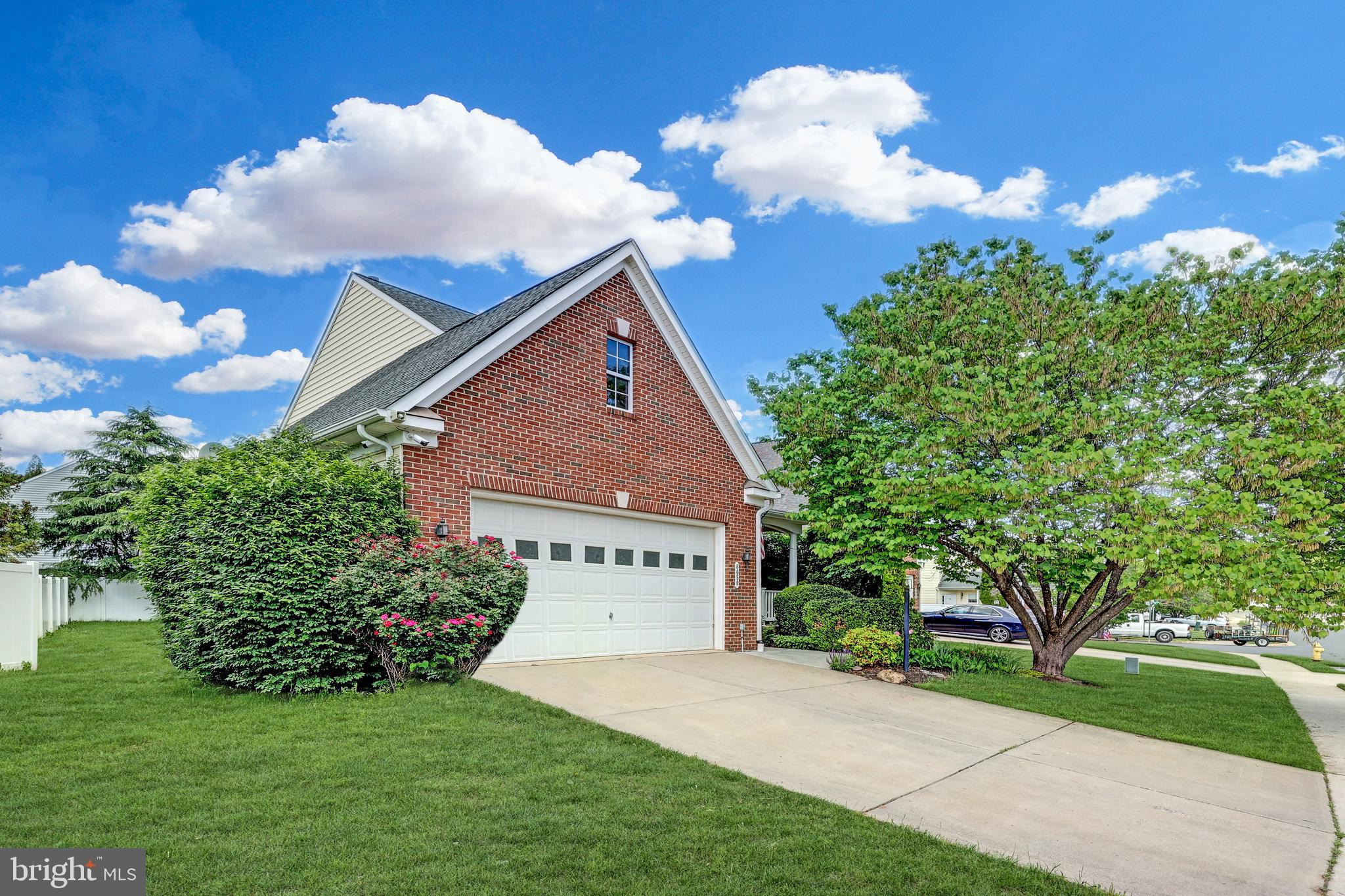 Welcome to this Well Maintained Home in Sought After Oaklands Community! Charming Brick-Front Home with Sunroom, Upgrades & Finished Walk-out Basement.

 This beautiful Brick-Front home offering a perfect blend of comfort, style, and functionality. Boasting 4 spacious bedrooms. Three Bedrooms and 2 full baths upstairs and one spacious Bedroom in the lower level.  Some rooms have been freshly painted.

Step into the inviting family room, complete with BRAND NEW  carpet, recessed lighting, crown molding, and a cozy natural gas fireplace with a white mantel—perfect for gatherings or relaxing evenings. The adjacent dining room area features elegant wide plank flooring and a classic chandelier. There is a lovely spacious powder room with wainscott and a pedestal sink. There is also a Dinette area right off of the kitchen- a perfect space for large family dinners or gatherings, while the sun-filled Morning room (or sunroom) impresses with vaulted ceilings, tile floors, ceiling fan, and a glass slider leading to a qaint deck, ideal for entertaining or enjoying peaceful outdoor moments.

The kitchen is a true highlight, featuring maple cabinets,  granite countertops, tile backsplash, stainless steel appliances (including a built-in microwave), and a SS refrigerator with icemaker & water that’s only (1 year old).

Upstairs, the primary suite offers a tray ceiling, a walk-in closet, and a private bath. The finished basement includes a 3rd full bath with tile flooring and a tub/shower combo, as well as a spacious 4th Bedroom or office with recessed lighting. The walk-up basement exit provides easy access to the fully fenced backyard, complete with a newer vinyl privacy fence.

Additional highlights include:

-Newer HVAC system (5 years old)
-Recently replaced Hot Water Heater (5 years old)
-New Nest smart system
-Attached 2-car garage
-Security camera system conveys

Located in a desirable community, this home combines thoughtful upgrades, warm character, and modern convenience—all in a great Manassas location.  Close to the Dar Alnoor Islamic Community Center Mosque & Masroor Mosque, Rt I-66, I- 95, VRE & 29. Tons of shops, restaurants, medical facilities and more close by. This won't last long!