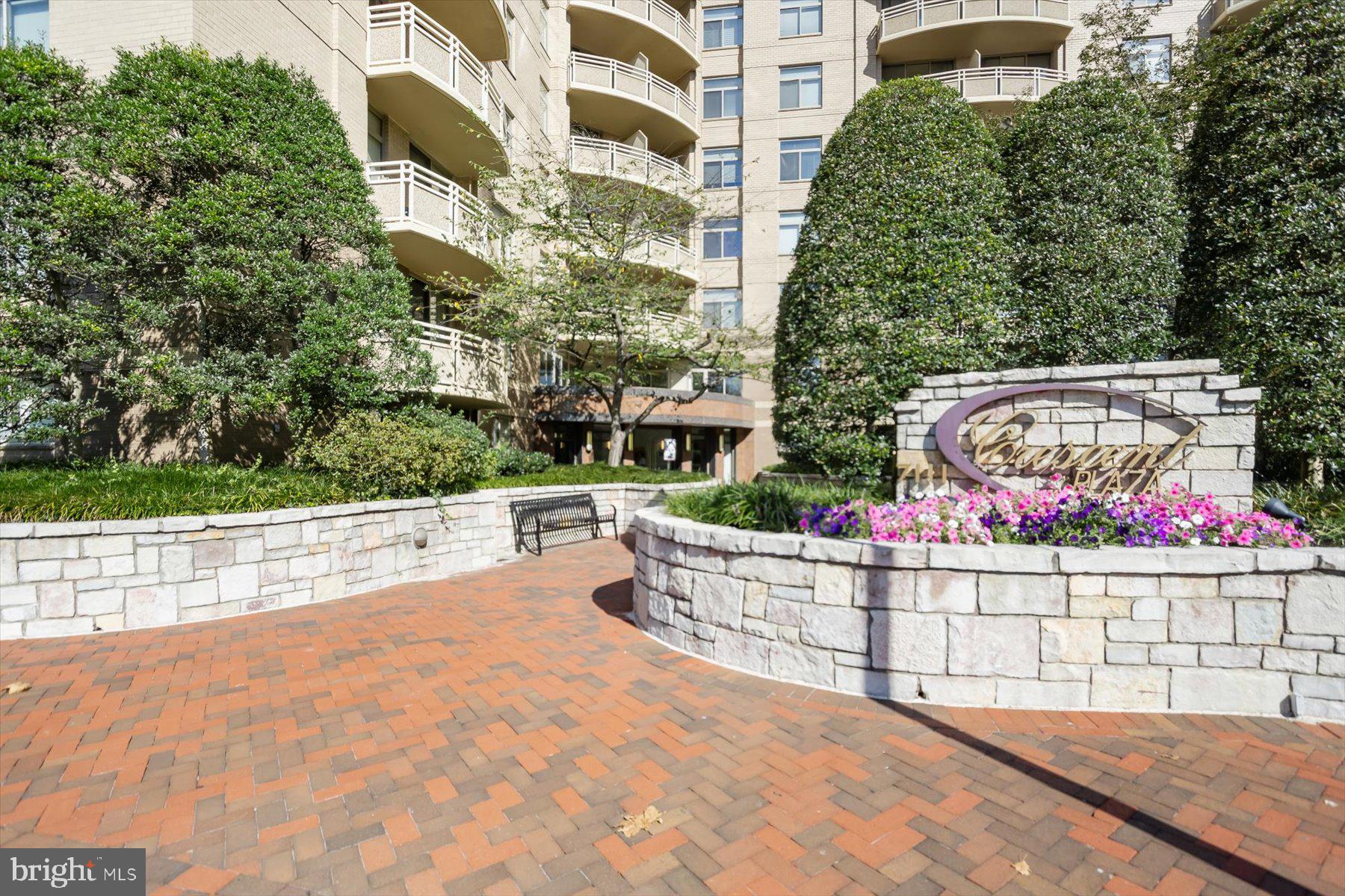 A HOP TO THE CRESCENT TRAIL!!

Very rarely available. Light-filled and beautifully renovated 2BR/2BA condo in one of Bethesda's most desirable locations. Rarely available with the community's most sought-after floor plan, featuring a kitchen thoughtfully tucked away from the entry. COMPLETELY UPDATED!

Enjoy spacious bedrooms with excellent closet space, inviting living and dining areas, and a west-facing BALCONY,  perfect for afternoon sunshine and sunsets. Recent improvements include TWO BRAND-NEW HVAC SYSTEMS, a RENOVATED KITCHEN WITH QUARTZ COUNTERTOPS, NEW CABINETRY, STAINLESS STEEL APPLIANCES, FULL-SIZE WASHER AND DRYER.  Additional updates include LVP FLOORING, UPDATED  bathrooms w/NEW QUALITY VANITIES, MIRRORS, FAUCETS, fresh paint, and contemporary lighting and fixtures throughout. ...Over $50,000.00 spent on improvements, including the HVAC systems!

Offering true move-in-ready convenience, this home also includes TWO GARAGE PARKING SPACES.  Ideally located just minutes from Metro, downtown Bethesda's restaurants, shops, and entertainment, while tucked away in a peaceful, private setting.

A rare opportunity to enjoy worry-free living with major system upgrades already completed. Simply move in and enjoy!

Not to be missed!
