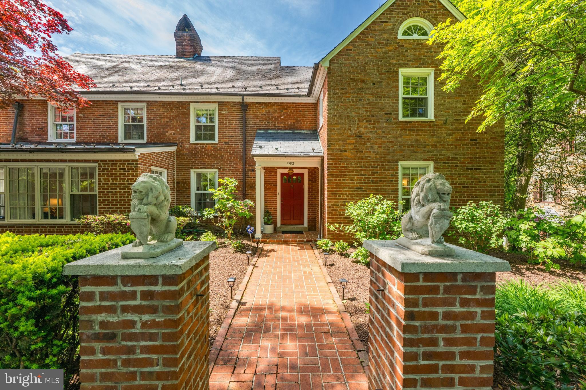 Located in the sought-after Colonial Village neighborhood of NW Washington, DC, this 5BR/5.5BA residence offers four finished levels with a layout designed for both everyday living and entertaining. Sited on a rare one-third acre lot backing directly to Rock Creek Park, the home enjoys exceptional privacy and serene, tree-lined views. The main level features a gracious entry with herringbone flooring, formal living room with fireplace and large formal dining room, a well-appointed renovated kitchen with gas range in center island, quartz counters, double stainless-steel dishwashers, and tons of cabinet space. The kitchen's arched doorways open to a large family room that leads to the 2-car garage.  A sunroom/office with floor-to-ceiling windows off the living room captures sweeping views of the terraced yard and pool, creating a natural extension of the living space. Inlaid wood and marble flooring add charm and character throughout. The second level offers a spacious primary suite with attached en-suite bath, generously sized secondary bedroom with en-suite bath, two more bedrooms and a shared hall bath. The top floor gives way to another bedroom suite with attached bath–perfect for a home office or guest room.  The fully finished lower level has additional living/rec room space with fireplace, optional den/bedroom, full bath, laundry room, and walk-out access to the backyard. The outdoor setting is a standout, with a beautifully terraced yard, 52 foot heated saltwater 11.5 deep pool, 10' x 20' Pergola, side yard set up for gardening, multiple areas for entertaining and could easily host 200 person event, and access to Rock Creek Park, offering a rare combination of privacy and proximity to nature. Please note: Square footage is estimated and calculated by an independent third party; information is deemed accurate but not guaranteed.
