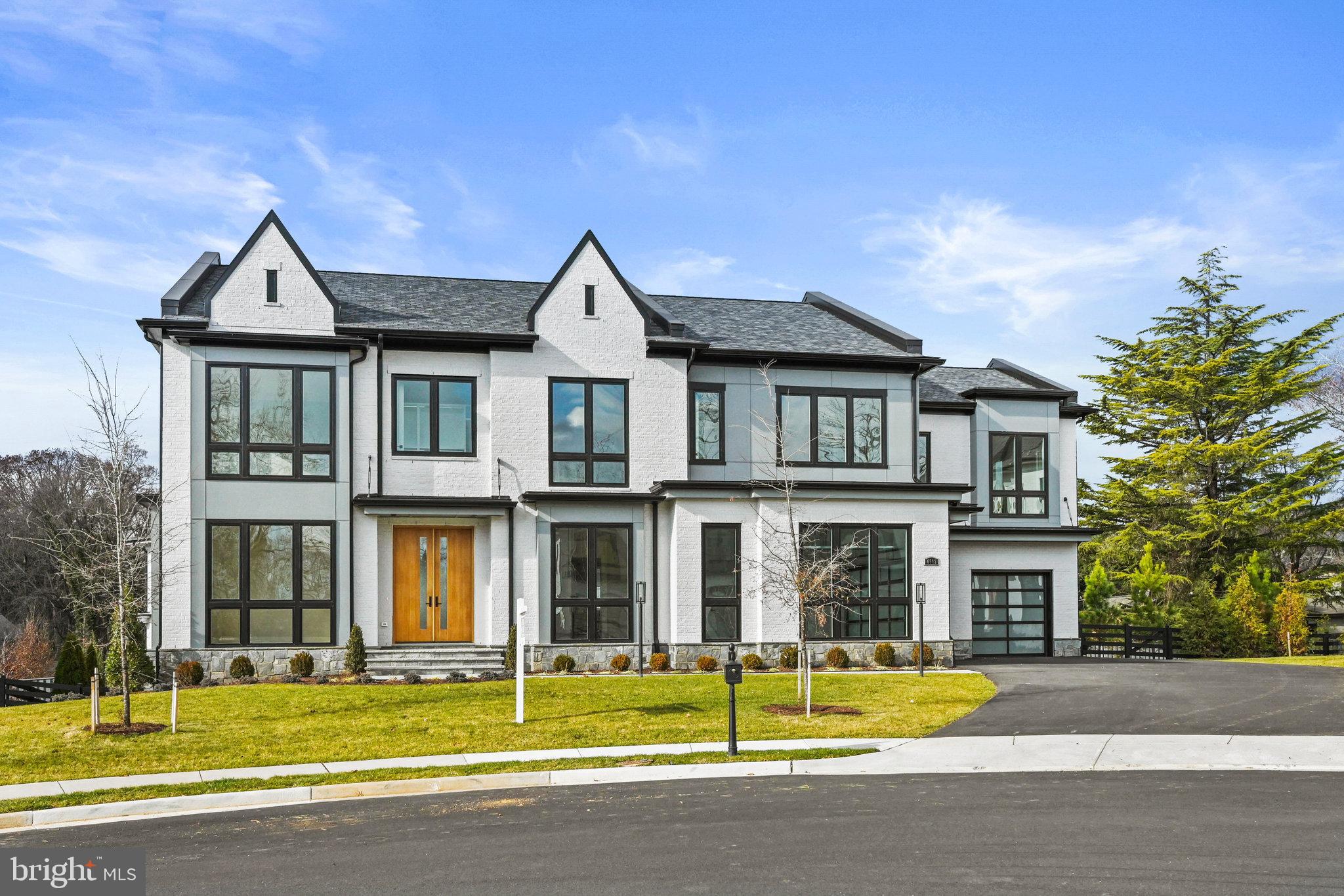 Contact Number is in Showing Contact.
Introducing an extraordinary residence nestled within the prestigious community of Halls Manor, one of Mclean's most sought-after neighborhoods, just a mere 13-minute drive from the heart of Georgetown in our nation’s capital. This remarkable home, the Waterford model situated on lot #2, offers an exquisite fusion of timeless elegance and contemporary comforts, encompassing a sprawling 10,478 square feet of both indoor and outdoor living space, including garages.

Step through the grand 9-foot Sapele Mahogany front doors into a realm of luxury, where soaring 11-foot ceilings greet you, bestowing a sense of grandeur upon the space. The interior is adorned with 5-inch Solid American white oak floors, suffusing each room with a welcoming warmth. Signature floor-to-ceiling windows bathe the home in natural light, seamlessly blending the indoors with the outdoors, while intricate trim details, boasting 10-inch baseboards, 8-inch crown trim, and 5 ½-inch casings around windows and doorways, add to the home's allure.

The Main Level boasts a sunlit Family Room, Formal living room, Dining room, and a main level suite with an attached full bath, complete with its own private entrance and car garage.  An Elevator  whisks you effortlessly between all three floors of this splendid residence.

The heart of the home, the gourmet kitchen, is a chef's dream, outfitted with top-of-the-line  Stainless appliances, including a 6-burner range, custom door fridge, dual dishwashers, dual sinks, and a convenient pot filler. A butler’s pantry, featuring an additional fridge and a built in Coffee machine, complements the kitchen, providing ample storage and prep space.

The Upper Level comprises 4 generously sized bedrooms, each with its own walk-in closet and en-suite bath, along with a versatile loft area and a spacious laundry room equipped with 2 washers and 2 dryers. A lower living area beckons with its open floor plan, complete with a full wet bar and a plethora of entertainment options, including a tasting room and an exercise room, sauna, and spa.

Outside, lush greenery ensures privacy for outdoor gatherings, while a covered porch with retractable screens and a double-sided fireplace offers a cozy retreat. Two  outdoor kitchens one on the main level on the deck, and one on the lower level on the covered patio, lounge area, and fireplace provide the perfect setting for alfresco dining and relaxation.

Discover the epitome of luxury living at Premier Homes Group, where every detail has been meticulously crafted to offer a lifestyle of unparalleled sophistication and comfort. Visit us on Google to learn more about this exceptional opportunity.
Find us on Google.  Premier Homes Group. Unfinished area includes: patio, covered porch, covered terrace and three car garage.