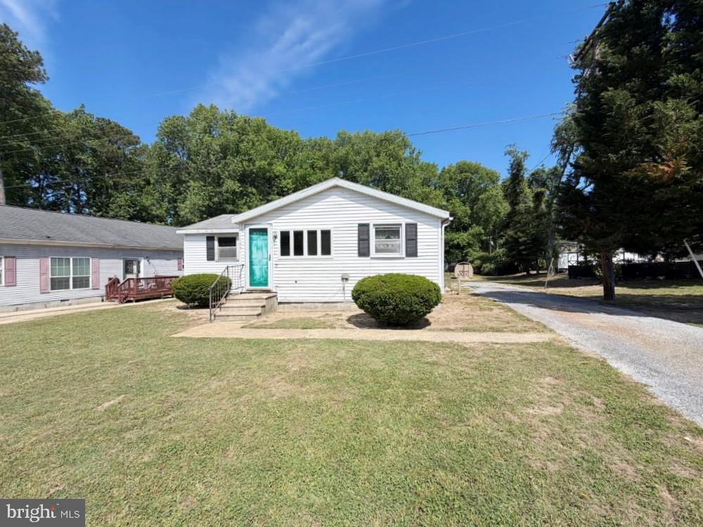 This charming country rancher, located just outside of Downtown Berlin, offers the perfect blend of peaceful country living and a convenient location, close to shopping, dining and entertainment. Outside, the expansive  lot provides endless possibilities for outdoor activities, gardening, or simply enjoying the tranquility of nature. A convenient shed offers extra storage for tools and equipment. Parking is a breeze with a dedicated driveway, ensuring easy access for you and your guests. Just a few miles form Assateague Island and Ocean City beaches, this home is ideal for a full-time residence or vacation getaway.