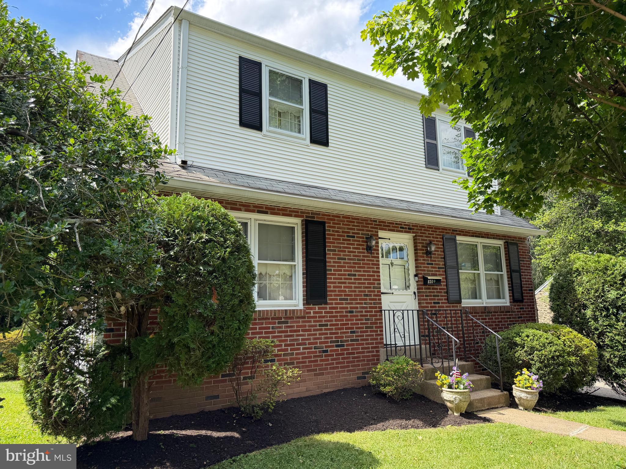NO WAITING---THIS HOME IS READY FOR IMMEDIATE SETTLEMENT!!  Don't miss this fantastic property located in attractive Abington township. Stately Ardsley brick single home awaits the new buyer's decorating ideas! Under the carpet are genuine hardwood floors with great potential for gleaming presentation. With some "sweat equity", the new owners will have a long-lasting home and real estate investment. The house possesses huge rooms and offers a 3-4 bedroom lay-out with a 4th bedroom or den on the main level. The interior features a spacious basement [28x18 finished side & 28x12 workshop/laundry side] with Bilco doors to the outside. The main level features entrance living room, eat-in kitchen, den or 4th bedroom, powder room, and an outside exit to [23x10] brick covered patio overlooking a wonderfully landscaped private rear yard with mature trees and a gardener's shed. The second floor has 3 large bedrooms and 2 full bathrooms! The heater and central air system have all been updated. Off street parking in the private driveway is ample for 6 cars! Come and make an offer before you miss this chance !!