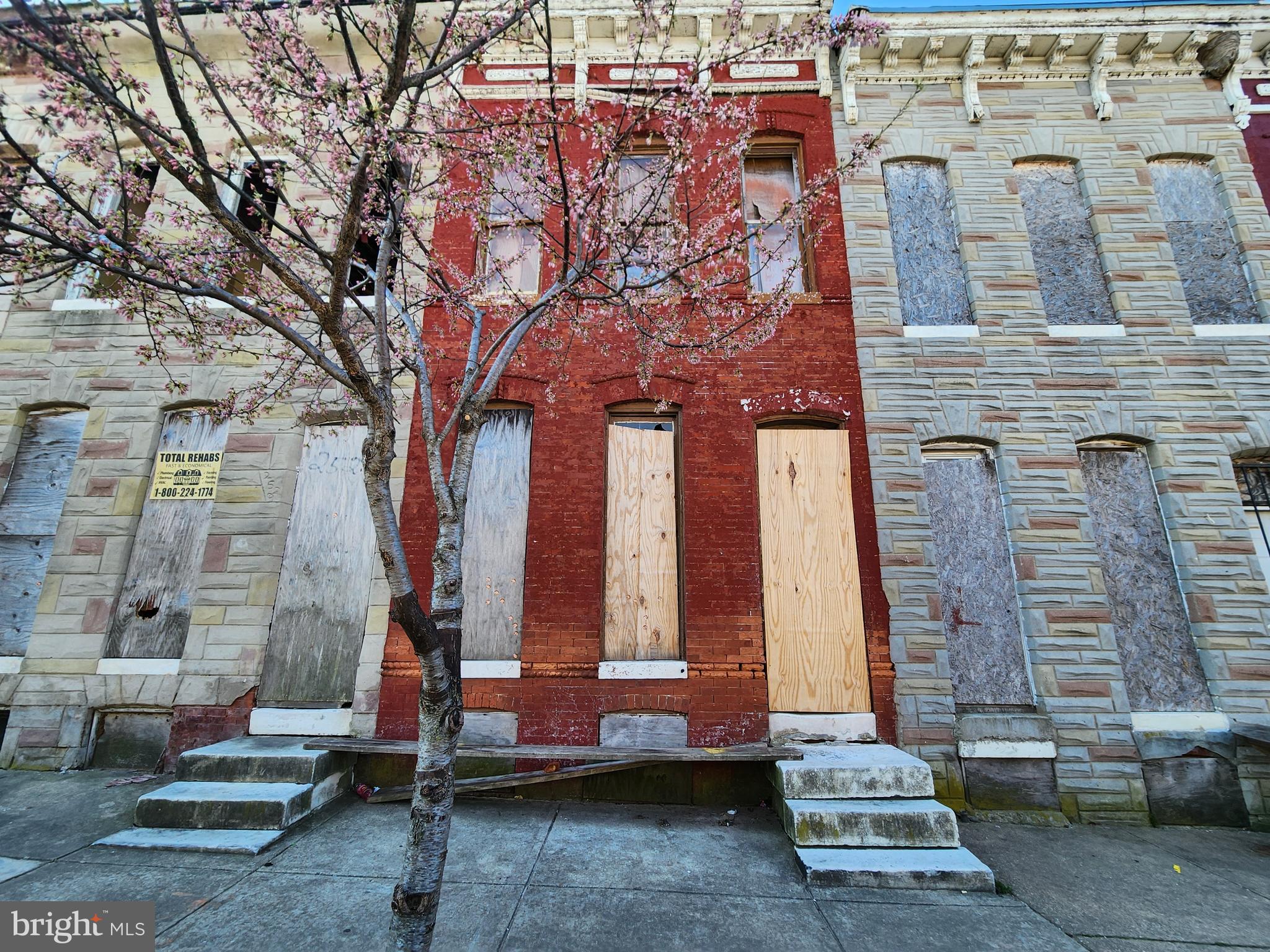 ONLINE AUCTION: This auction takes place on the Ashland Auction Group website bidding platform. Bidding begins 4/20/2026 @ 10:00 AM. Bidding ends 4/22/2026 @ 11:50 AM. The list price is the suggested opening bid. Deposit: $5,000.

This two-story townhouse is located in the Berea neighborhood of Baltimore City. Residents can enjoy the nearby attractions and facilities such as the Clifton Park and Northeast Market. The property is vacant and currently boarded. It is conveniently located near major traffic arteries including E North Avenue.
