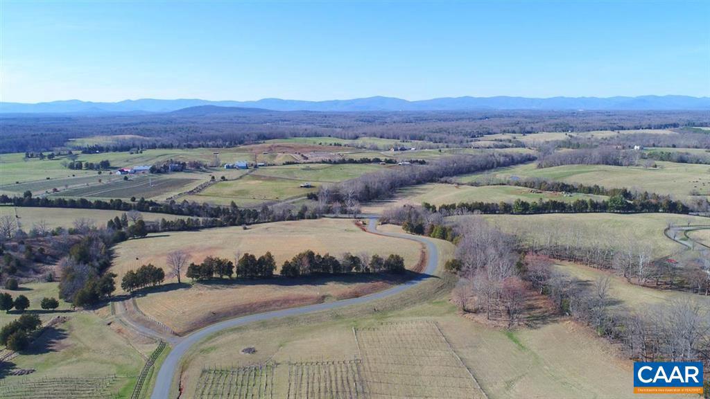Talk about a SCENIC location! You'll love waking up each morning to a beautiful sunrise when you build your dream home on this charming lot! VIEWS! Blue Ridge Mountains, vineyards, rolling hills, valley - panoramic as far as the eye can see.  Located just 11 miles from Charlottesville, this is a great opportunity for you!