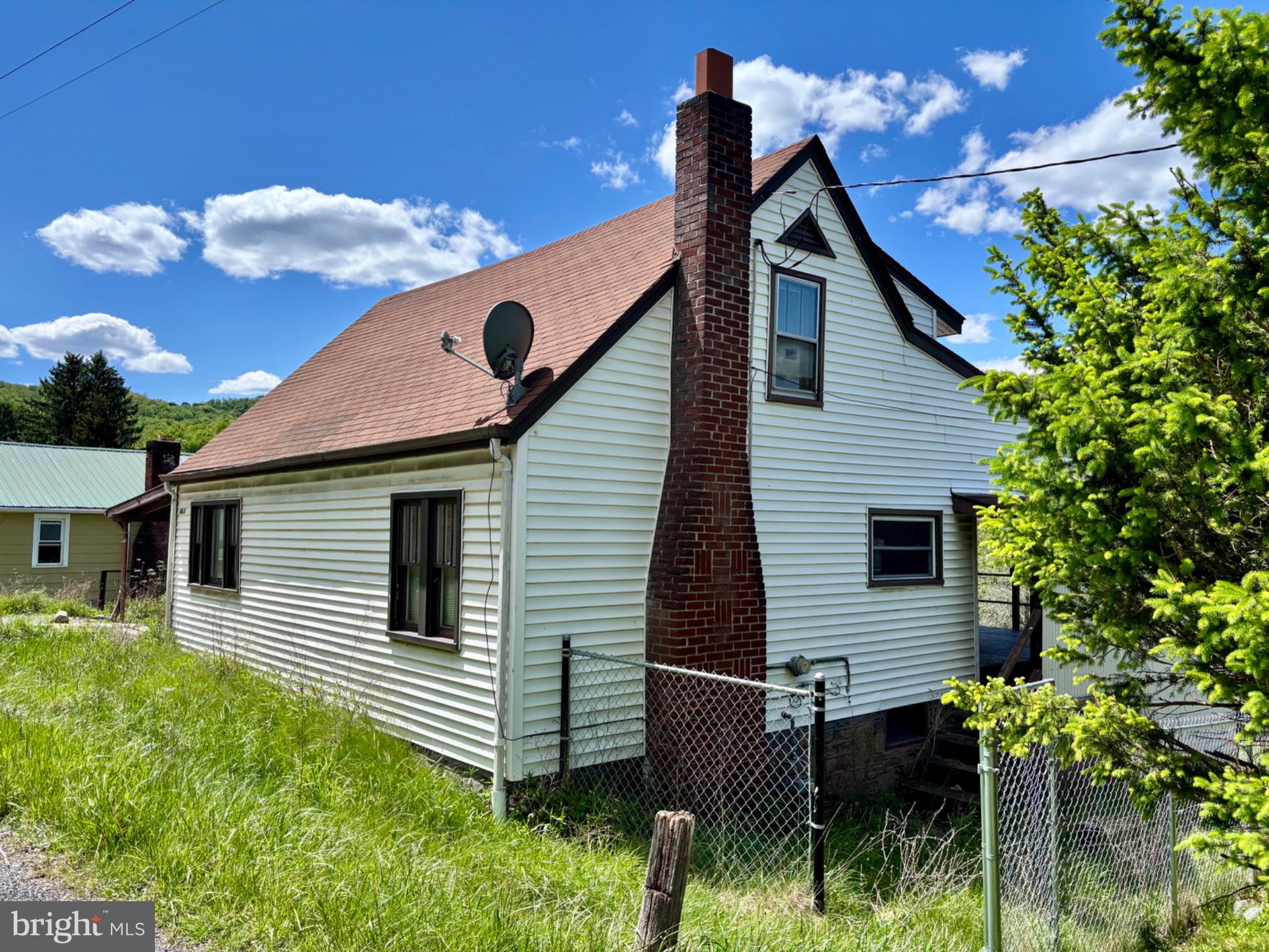 Welcome home to this charming 3-bedroom, 1-bathroom single-family home nestled in the heart of Frostburg! Perfectly blending convenience and privacy, this property is virtually move-in ready and priced to sell. Enjoy the best of small-town living with an easy, walkable commute to historic Main Street, local dining, the Frostburg Trail System, and the popular Tracks and Yaks rail-biking excursions. 
Tucked away in a private, easily accessible location, the home boasts a scenic backyard perfect for relaxing, gardening, or taking in the mountain views. Whether you are looking for your first home, downsizing, or seeking a turnkey rental property, this is a rare find in today's market. Don't miss out on homeownership for under six figures—call to schedule your private showing today!