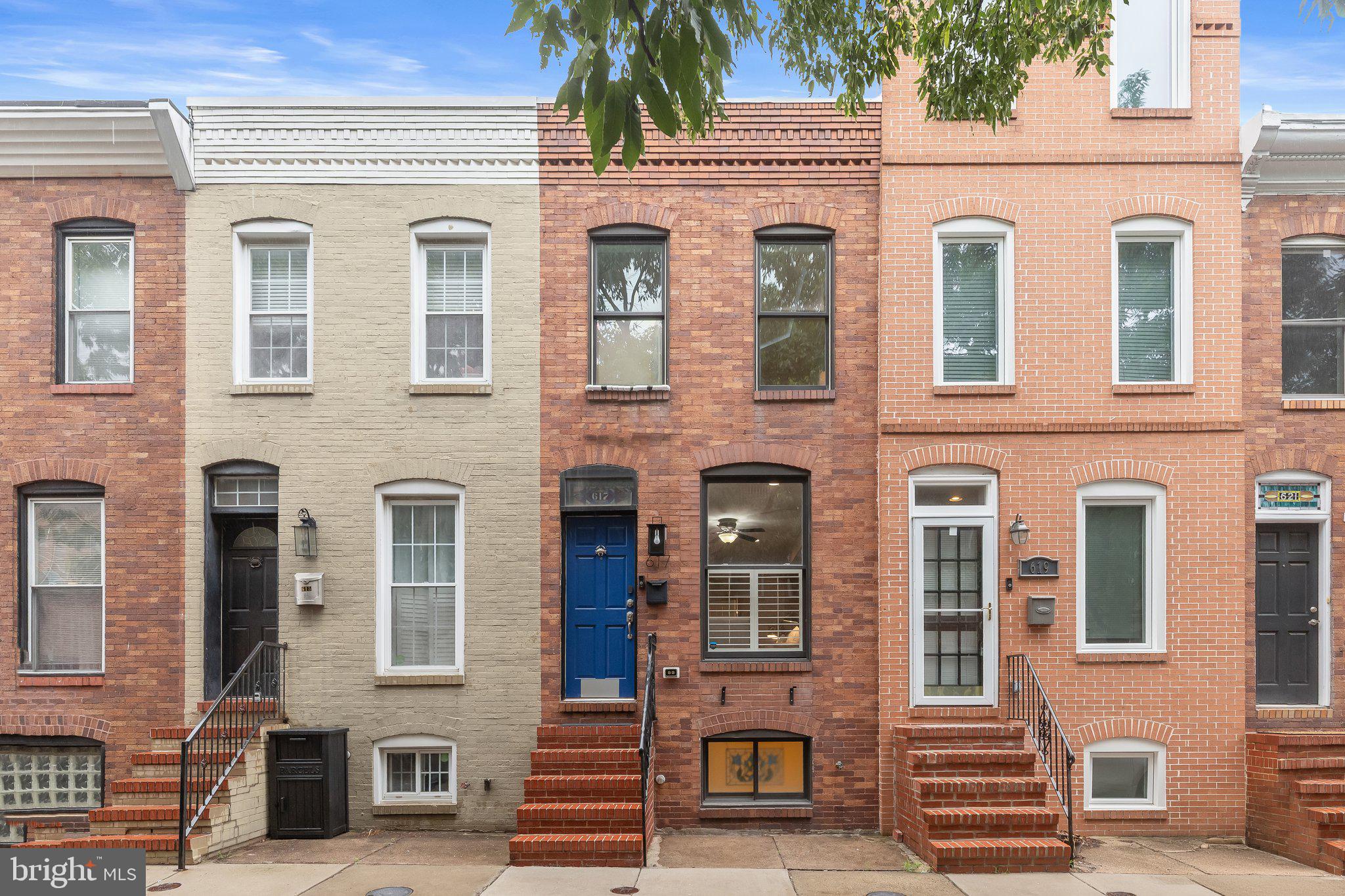 Welcome to this beautifully appointed city home in the heart of Baltimore's sought-after Canton neighborhood, where timeless charm meets modern convenience. From the moment you step inside, you'll appreciate the thoughtful architectural details, including crown molding, a stained-glass transom window, chair railing, an exposed brick accent wall, and gleaming hardwood floors that flow throughout the main level. The well-appointed kitchen is designed to impress, featuring 42" cabinetry, upgraded countertops, stainless steel appliances, and a breakfast area perfect for casual dining and morning coffee. The upper level offers a spacious primary suite highlighted by a tray ceiling, plush new carpeting, and an en-suite bath with a double vanity. An additional bedroom and full bath complete this level, along with an upper-level laundry room for everyday living made effortless and efficient. The fully finished lower level offers exceptional flexibility, serving as an additional bedroom, recreation room, media space, fitness area, or home office to suit your lifestyle. Step outside and take entertaining to the next level on the rooftop deck, where you can relax and enjoy sweeping city views and the vibrant energy of Canton. A coveted rear parking pad provides the convenience of off-street parking, a true city luxury. Perfectly positioned in the heart of vibrant Canton, this home is just moments from an incredible selection of restaurants, pubs, boutiques, fitness centers, grocery stores, and neighborhood attractions. Enjoy a stroll along the scenic Waterfront Promenade, relax at Canton Waterfront Park, gather with friends in O'Donnell Square, or shop at Canton Crossing, all just minutes from your doorstep. Recent updates include fresh paint, carpet (2026), roof deck (2025), and HVAC (Trane, 2025), providing move-in-ready appeal. Offering the perfect combination of character, modern amenities, outdoor living, and an unbeatable location, this exceptional Canton residence embodies the very best of Baltimore city living.