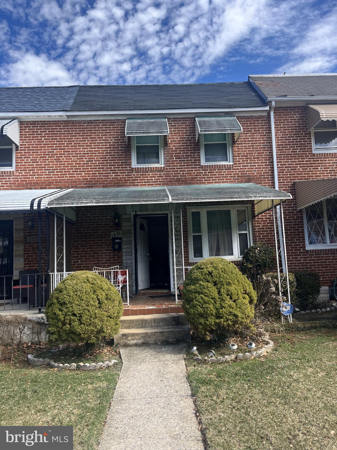 AGENT IS UNAWARE OF OFFERS.  For access please use ShowingTime.  Amazing opportunity to buy a charming brick rowhome featuring a classic covered front porch, perfect for relaxing evenings or morning coffee. Inside, you'll find three comfortable bedrooms and a full bath upstairs. The kitchen opens to a rear porch that overlooks the backyard. Large basement with half bath.  Perfect for investors. Hurry this place will not last! * INVESTORS CAN BID.*