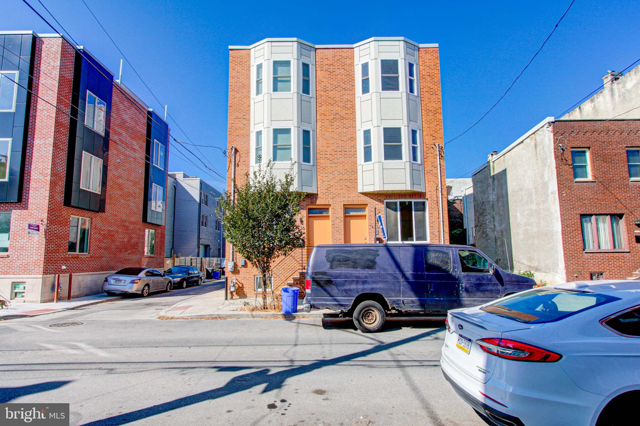 Standing tall at the corner of S 26th Street and Annin Streets in Philadelphia is this eleven year young property boasting over 2,000 sq ft of new amenities and desired upgrades. Approach a beautifully built brick facade on the exterior and then enter into an eclectic mixture of modern flooring and design. With this property being a corner unit, the first floor shines with natural light and offers a generous amount of space to create the perfect living room and kitchen entertaining space. The kitchen has a stunning display of pristine white subway tiling, coordinating shaker cabinetry, a gorgeous slate of countertops, and a stainless steel appliance package to tie it all together. The second floor offers two full sized bedrooms each displaying the same modern flooring and details as seen throughout so far! These bedrooms share a beautifully tiled and updated full bathroom in the hallway! Continue to venture upstairs to the third floor and discover a the master suite with a gorgeously sized bedroom, walk in glass enclosed shower with dual vanities, cabinet space, as well as a hallway wet bar for your enjoyment! The entertaining space continues all the way up to the private rooftop deck overlooking the city skyline! Downstairs in the lower most part of the property is a full finished area offering you a fourth bedroom and third full shower and also access to the laundry room!  Consider adding seeing 1136 S 26th Street to your list of properties today!