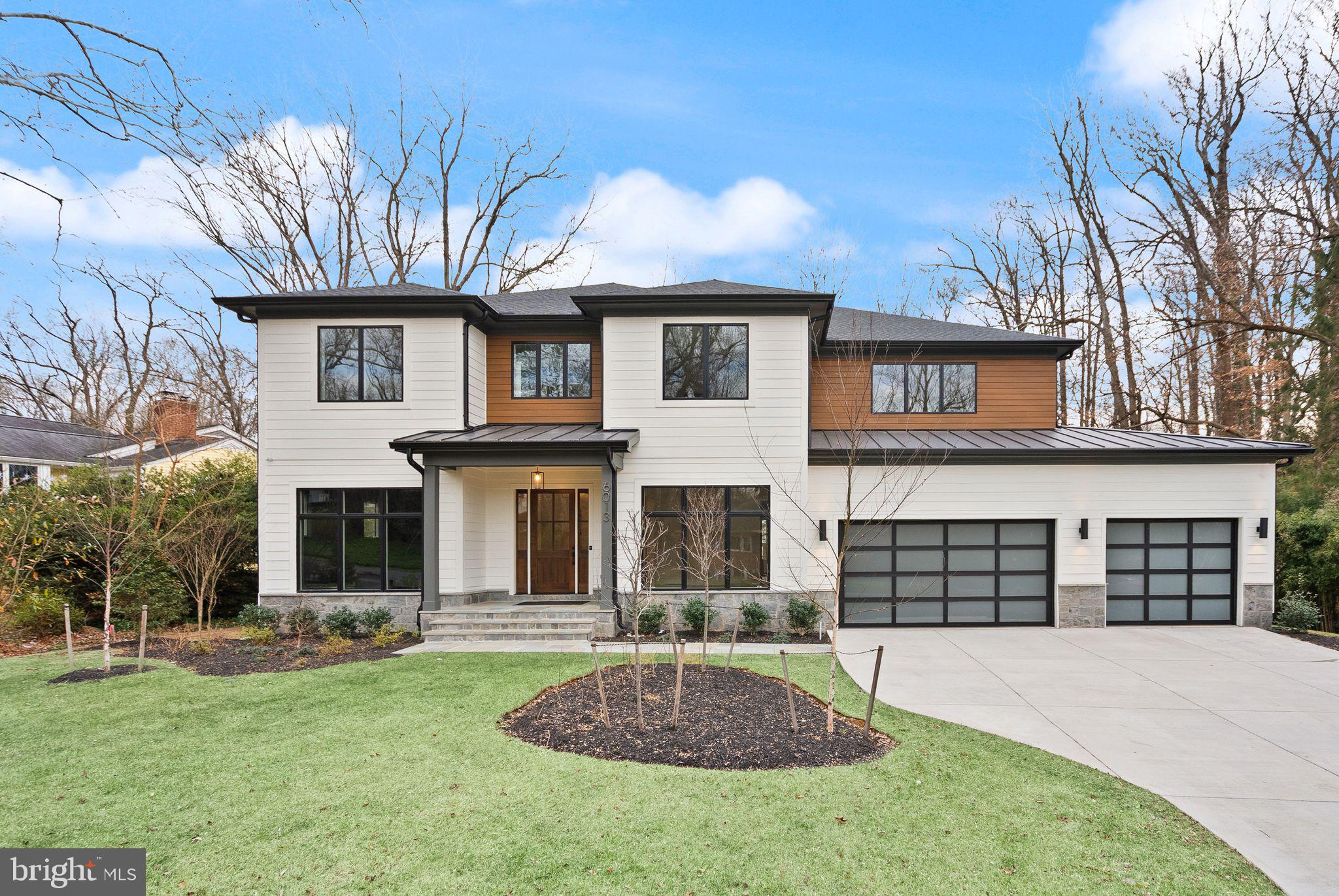 PRICED REDUCED! New transitional-style construction in Chesterbrook Woods on a level 17,614-square-foot lot. This home offers nearly 8,500 finished square feet on three levels with six bedrooms, six full bathrooms, and one half bath with ELEVATOR ROUGH-IN and a THREE-CAR GARAGE.
The main level includes a foyer, formal living room or office with built-ins, formal dining room with butler’s pantry, family room, breakfast area, and a kitchen with dual islands, inset cabinetry, Wolf and Sub-Zero appliances, quartz countertops, and a walk-in pantry. A main-level bedroom with en-suite bath, private office, mudroom with built-ins, and powder room are also located on this level.
Upstairs, the primary suite includes a sitting room, fireplace, two walk-in closets, and a bathroom with soaking tub, double vanity, large shower, and heated floors. Three additional bedrooms with en-suite baths and a laundry room complete the upper level.
The lower level features a recreation room with wet bar and wine room, exercise room, bedroom with en-suite bath, and powder room. Outdoor spaces include a screened porch and open deck.
Additional features include ceiling speakers, storage, wired for EV charging. Convenient to the GW Parkway, Route 123, parks, shopping, and dining. Zoned for Chesterbrook Elementary, Longfellow Middle, and McLean High School.