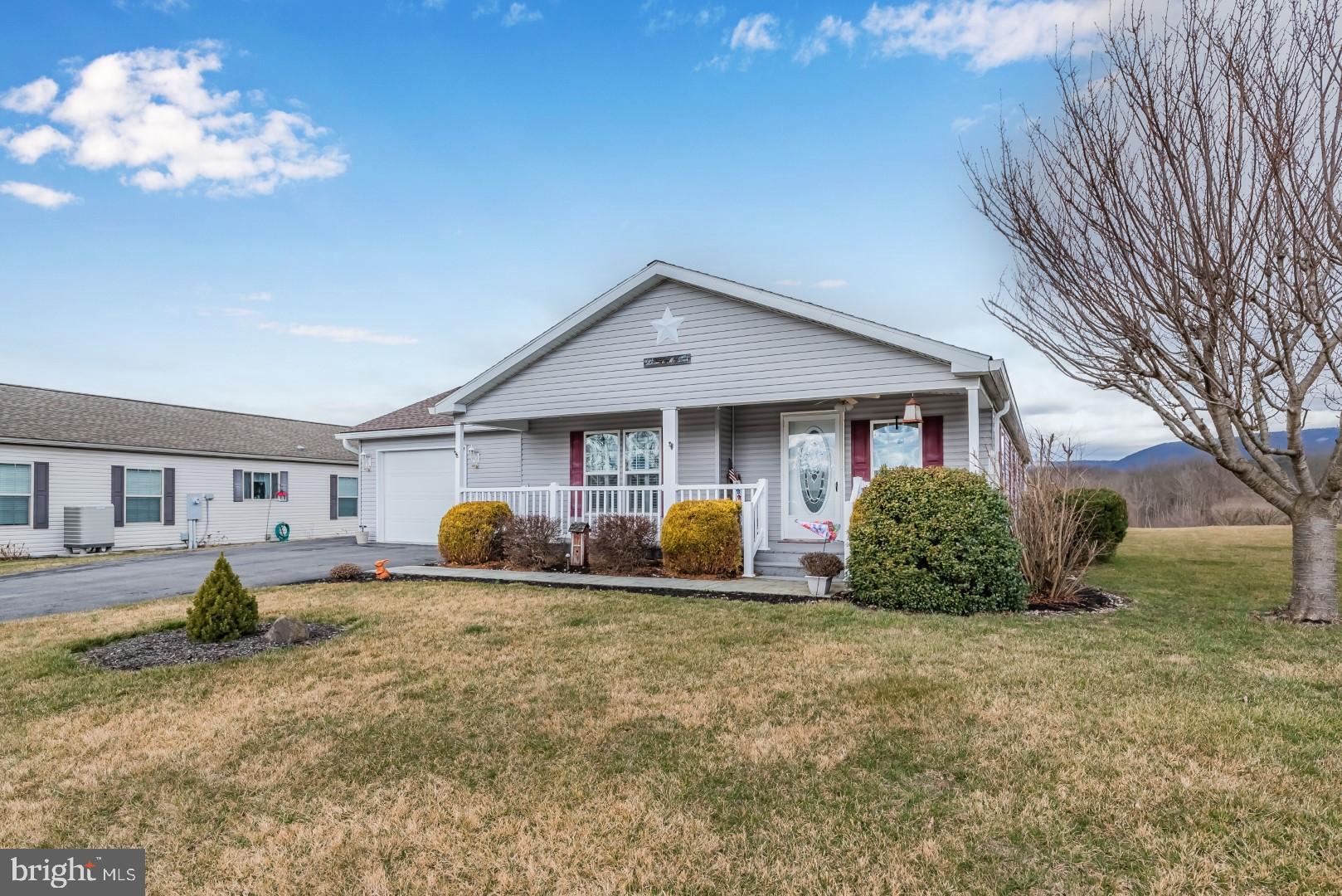 Superb Adult Community Home. Each room has gorgeous built-ins - a huge hutch in both the dining room and kitchen, entertainment center in both the family room and living room. Enjoy Mountain views as you relax in  private Screened-in back porch that overlooks the community pond. Owner’s suite with walk in closet. Stamped patio and walkways. This home also features an oversized 1-car garage perfect for a man cave, and a large shed to keep all of your gardening  tools and landscaping equipment. Too much to mention!