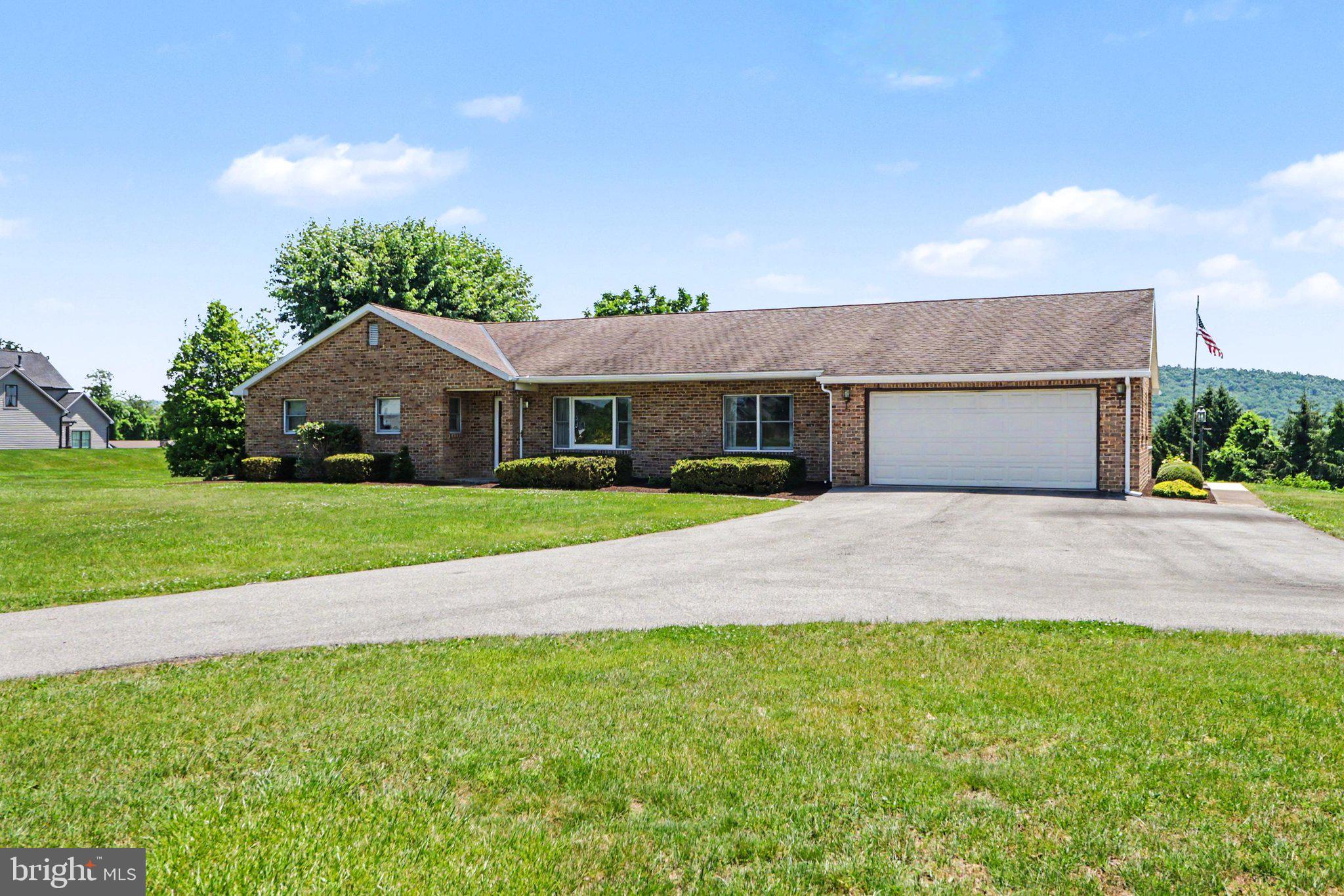 Single-floor living with mountain views on almost 5 acres! This all-brick ranch offers more living space than first meets the eye.
<br><br>
The Kitchen opens to a sunny Breakfast Room where you'll enjoy views of the backyard and distant hills. Multiple gathering spaces provide flexibility for everyday living and entertaining, including a comfortable Family Room with a beautiful brick hearth and wood-burning stove insert, plus a spacious Living Room at the front of the home.
<br><br>
The formal Dining Room is ready for holiday gatherings, or consider repurposing it as a home office, library, or study. Three bedrooms include a Primary Suite with its own Full Bath, while the Full Bath off the hallway features a recently updated shower. Convenient first-floor Laundry Room adds to the home's practical design.
<br><br>
Abundant storage space and finished Hobby Room in basement.
<br><br>
 Efficient hot water baseboard heat can be supplemented by the wood stove insert, while central air keeps things comfortable during the summer months. Plenty of room for vehicles, equipment, hobbies, and storage with both a two-car attached garage and a large outbuilding.
<br><br>
Located in a popular Dillsburg area setting with easy access to Route 15, Route 74, grocery stores, and convenient commutes to York, Harrisburg, Mechanicsburg, and Carlisle.
<br><br>
One-year home warranty included.
