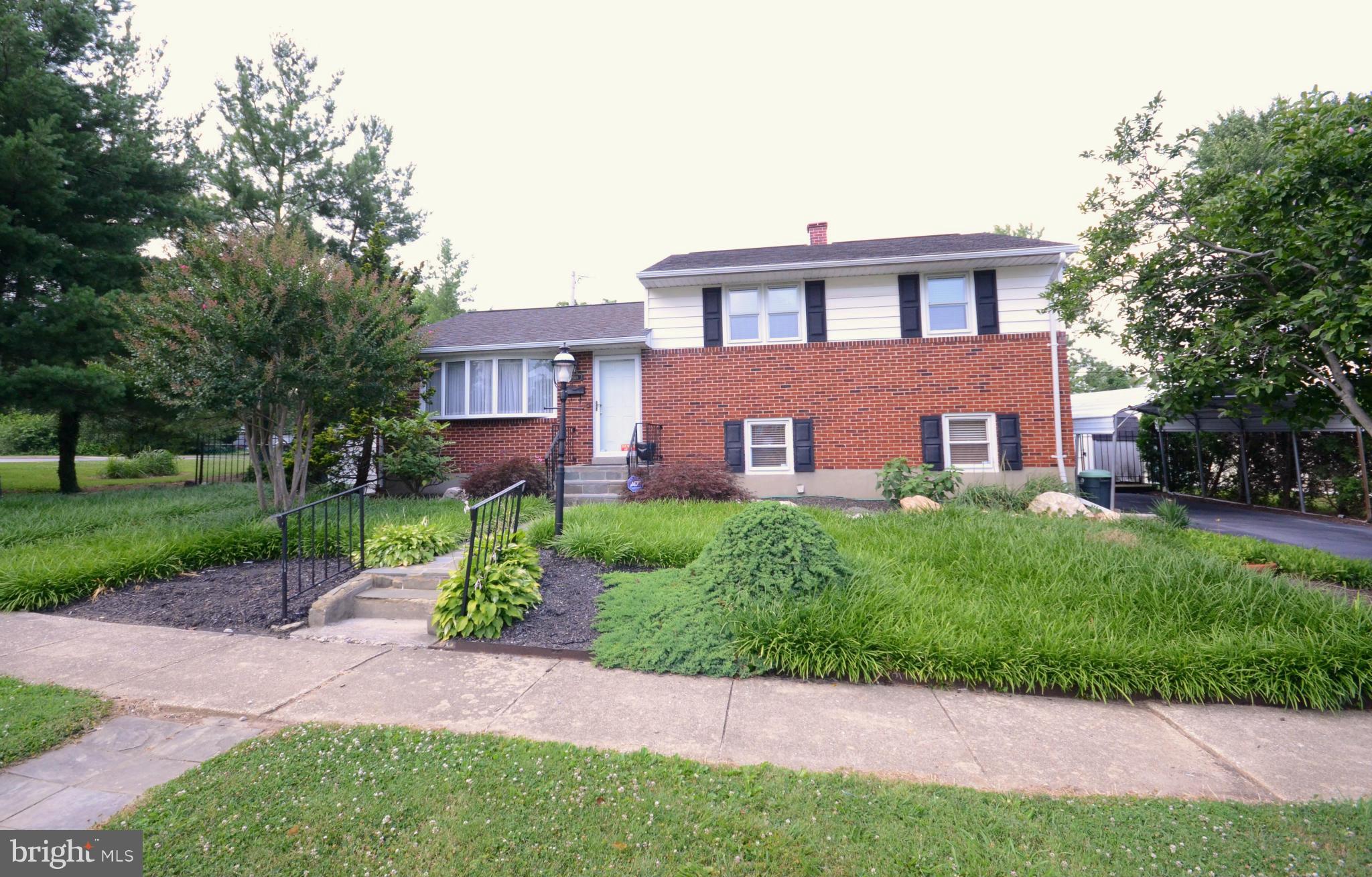 In absolutely move-in condition, this pristine split level boasts a gorgeous updated Kitchen, beautiful hardwood floors & storage galore! LL Fam Rm offers fp & exposed brick walls & walks up to rear patio & pool. Enjoy the changing seasons & the lushly landscaped grounds from the Enclosed/Screened Porch & patio. Featuring vinyl replacement windows & a new roof (2010), this gem is ready for you!