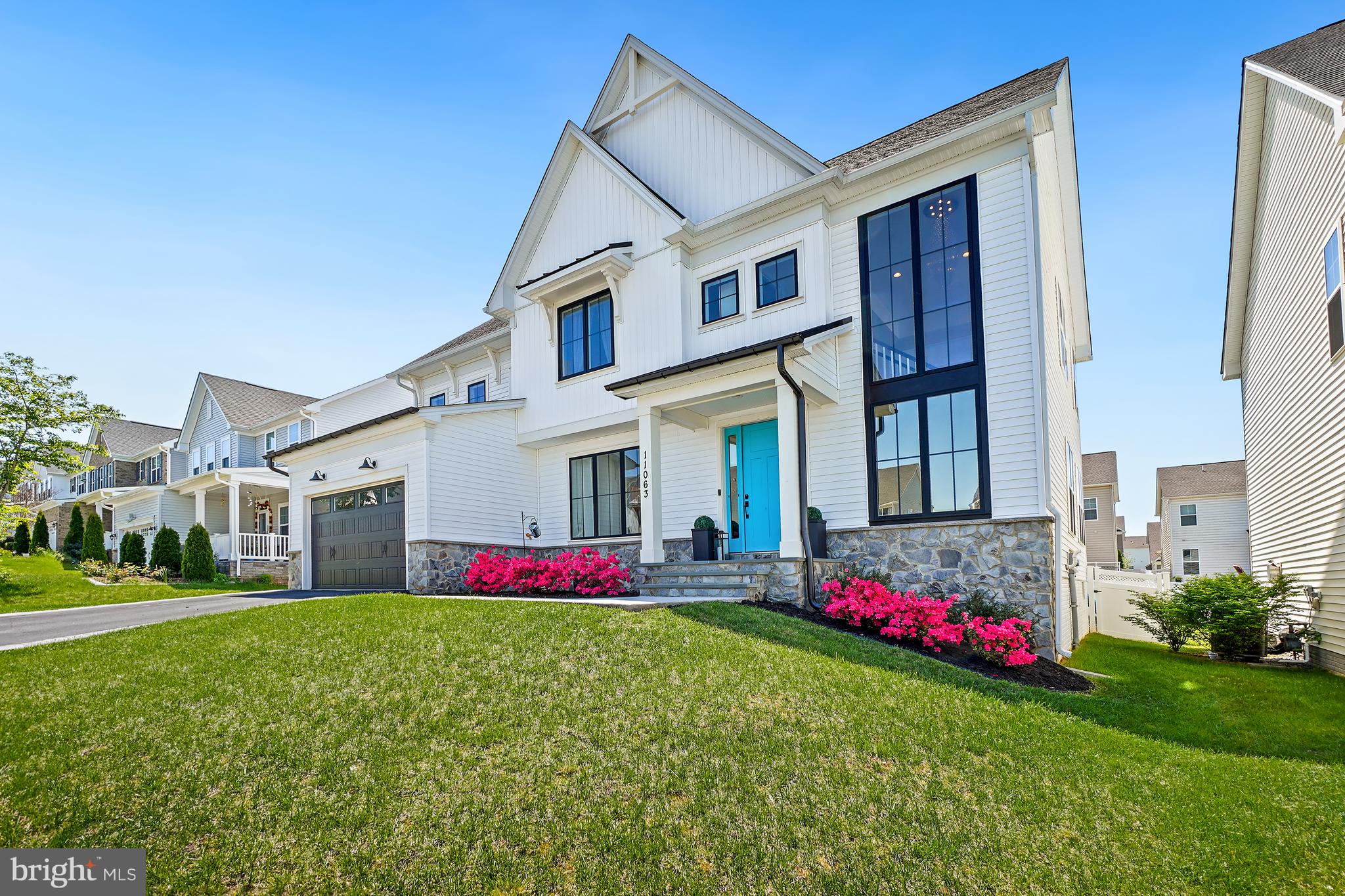 Welcome to 11063 Emerald Crown Drive, a stunning Northeast - facing residence in the highly sought-after Landsdale community of Monrovia. Built in 2020 by Wormald Homes, this exceptional Taylor model showcases over $148,000 in builder upgrades, further enhanced by thoughtful post-construction additions that elevate both style and function.

Offering 5 bedrooms and 4.5 baths, this home features a bright, open-concept main level designed for modern living. The heart of the home is the oversized kitchen island, complemented by a marble backsplash, abundant cabinetry, and seamless flow into the dining and family rooms. A striking linear gas fireplace anchors the family room, while a private studio office with barn doors provides the perfect work-from-home space. Enjoy effortless indoor-outdoor living with direct access to the rear screened-in porch, overlooking the fully fenced backyard and flagstone patio—ideal for entertaining or relaxing.

Upstairs, a versatile loft with custom built-ins offers additional living space. The luxurious owner’s suite makes a grand impression with 8-foot double entry doors and a spa-inspired bath featuring a frameless glass shower and freestanding soaking tub. Two generously sized bedrooms share a well-appointed Jack-and-Jill bath, while a fourth bedroom enjoys its own private ensuite. All bedrooms include spacious walk-in closets and upgraded carpet with enhanced padding for added comfort.

The fully finished lower level expands your living options with an expansive recreation area and the desirable basement retreat upgrade, which includes a legal fifth bedroom with a large walk-in closet and an expanded full bath—perfect for guests or multi-generational living.

Additional post-build enhancements include custom built-ins, a full rear privacy fence, a flagstone patio, and designer finishes throughout.

Located in the vibrant Landsdale community, residents enjoy resort-style amenities including a clubhouse, outdoor pool, tennis courts, playgrounds, walking trails, and community events, all with convenient access to commuter routes, shopping, and dining.

This is a rare opportunity to own a meticulously upgraded, nearly new home in one of Monrovia’s premier neighborhoods.