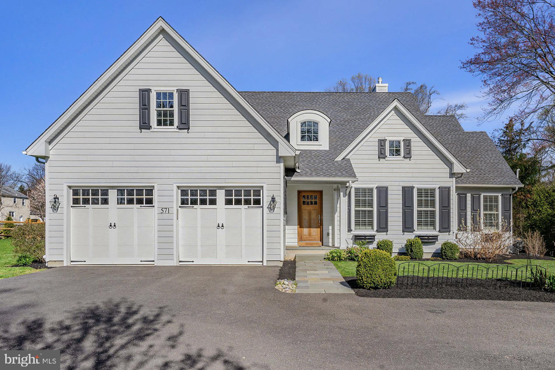 Your Blue Bell dream home is tucked away at the end of a private road off Skippack Pike in the highly sought-after Wissahickon School District!  This newer construction 4 Bed / 3.5 Bath masterpiece with a stunning recently finished basement is luxury living at its finest.  Built in 2016 with meticulous attention to detail, this custom home boasts over 4,500 square feet of elegant living space, showcasing impeccable architectural design and superior craftsmanship.  A welcoming blue stone walkway leads you to the front door where you are greeted with high ceilings, beautiful wide-plank oak hardwood floors, and an abundance of natural light flooding every corner.  The main floor features an idyllic formal living room with vaulted ceilings, a sophisticated great room that features a gas fireplace with a solid marble surround, custom built-in shelving and cabinetry, and an open-concept floor plan connecting to the kitchen and dining area - a perfect place to host your gatherings.  Prepare to be captivated by the custom kitchen, featuring an oversized island with pendant lights, an abundance of white cabinetry with crown molding, under-cabinet lighting, a matching white wood range hood, beautiful Carrera marble countertops, a farmhouse sink, and stainless steel appliances including a six-burner Viking range and refrigerator.  Next to the refrigerator are integrated cabinet-style double doors that open to the huge hidden walk-in butler’s pantry with floating shelving and marble-topped cabinetry - a true showpiece!  Beside the kitchen is a formal dining area with double French doors that open to the fully composite deck area with a pergola.  Indulge in the ultimate comfort and convenience of the first-floor owner’s suite, complete with plush carpeting, custom plantation shutters, 2 large walk-in closets, and a lavish ensuite bath featuring a frameless glass shower with solid marble surround and flooring, a freestanding soaking tub, a double vanity with ample storage, high wainscotting and a linen closet.  Completing the main floor is a large laundry room with cabinetry and a full sink, a tastefully designed half bath, recessed LED lighting, plantation shutters throughout, crown molding, additional storage closets, and access to the two-car garage.  Upstairs, discover three additional large bedrooms, two of which are connected by a Jack and Jill bathroom with a frameless glass subway tiled shower and double vanity, along with a versatile loft space with an alcove perfect for an additional living space.  The third bedroom is en-suite with a walk-in closet and full bath with classic subway tile and a frameless glass shower.  There is a huge unfinished attic storage room awaiting your finishing touches with architectural design plans (available upon request) already in place!  But the luxury doesn't end there.  The newly finished basement is a perfect entertaining or play space with over 1,300 SF of finished space offering 8.5 ft ceilings, luxury vinyl plank flooring, a dedicated office/5th bedroom with newer carpeting and a mini-split heat pump, a wine room with a built-in 55-bottle wine fridge and humidor (negotiable), and recessed LED lighting throughout.  This home also features a new roof, a large basement storage room, and multi-zoned HVAC.  The large two-car attached garage comes equipped with an EV outlet for your electric vehicle.  The exterior is constructed with Hardie Board siding, has a fully fenced backyard, and beautifully manicured landscaping.  Located in Wissahickon School District and with easy access to the PA Turnpike, Route 476 Route 202, restaurants, shopping and public transportation, this is the opportunity you've been waiting for!  Don't miss your chance to see this amazing home - schedule your showing today!