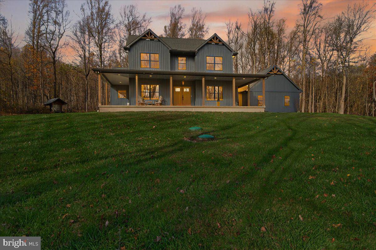 Welcome to 16080 Kelbaugh Road, a custom-built Zimmerman home nestled on over 4 scenic acres just minutes from Route 15 and the heart of Thurmont!  Thoughtfully designed,  this stunning 4-bedroom, 3-bathroom home offers main-level living and stunning finishes throughout.

Enter inside to discover an open-concept layout featuring durable LVP flooring, soaring vaulted ceilings, and black-trim windows that flood the space with natural light. The gourmet kitchen is a showstopper with granite countertops and backsplash, modern cabinetry, under-cabinet lighting, and an expansive 6-foot island. All appliances are gas, and the adjacent dining and living areas flow seamlessly.  The living room also features a cozy gas fireplace. French doors off the kitchen open to a half-wraparound porch with gorgeous views.

The main level primary suite is a serene retreat with a large walk-in closet and spa-like bath, complete with a dual-head walk-in shower, bench seating, and a double vanity.  The main level is finished off with a laundry/mud room, full bathroom and an additional bedroom. Located on the second level are two additional bedrooms and another full hallway bathroom.

Originally perced for up to 7 bedrooms, this home was built to allow for future expansion if desired.  This location is the perfect setting for anyone seeking space while still having convenient access to schools, shops, and commuter routes.

Don’t miss your chance to make this one-of-a-kind property your forever home—schedule your private showing today!