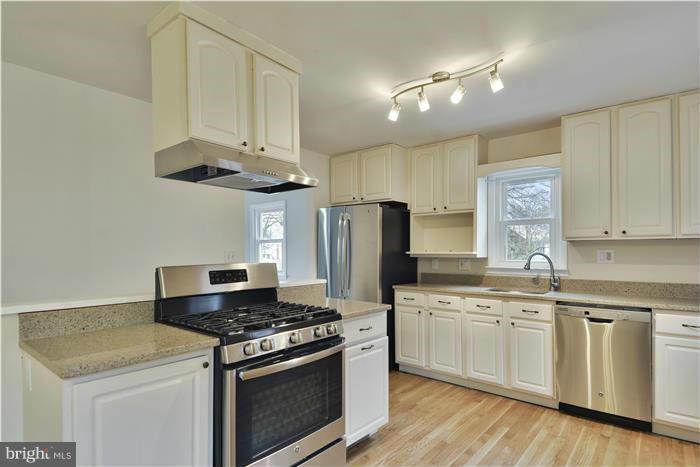 THIS IS A FULLY RENOVATED AND BEAUTIFUL HOUSE READY TO MOVE IN!! NEW FLOORS AND CARPET, FRESH PAINT, NEW BATHS, SPARKLES!! FROM THE LARGE & WONDERFUL KITCHEN TO THE IMMACULATE AND RICH HDWD FLOORS, YOUR CLIENT WILL LOVE THIS HOME!! SHARED DRIVEWAY AND CLOSE TO EVERYTHING.. TWO BEDRMS UP AND TWO LEGAL BEDROOMS DOWN. FINISHED AND WALK OUT BASEMENT W GORGEOUS CER TILE FLOORS.. YOU HAVE TO SEE THIS!!!
