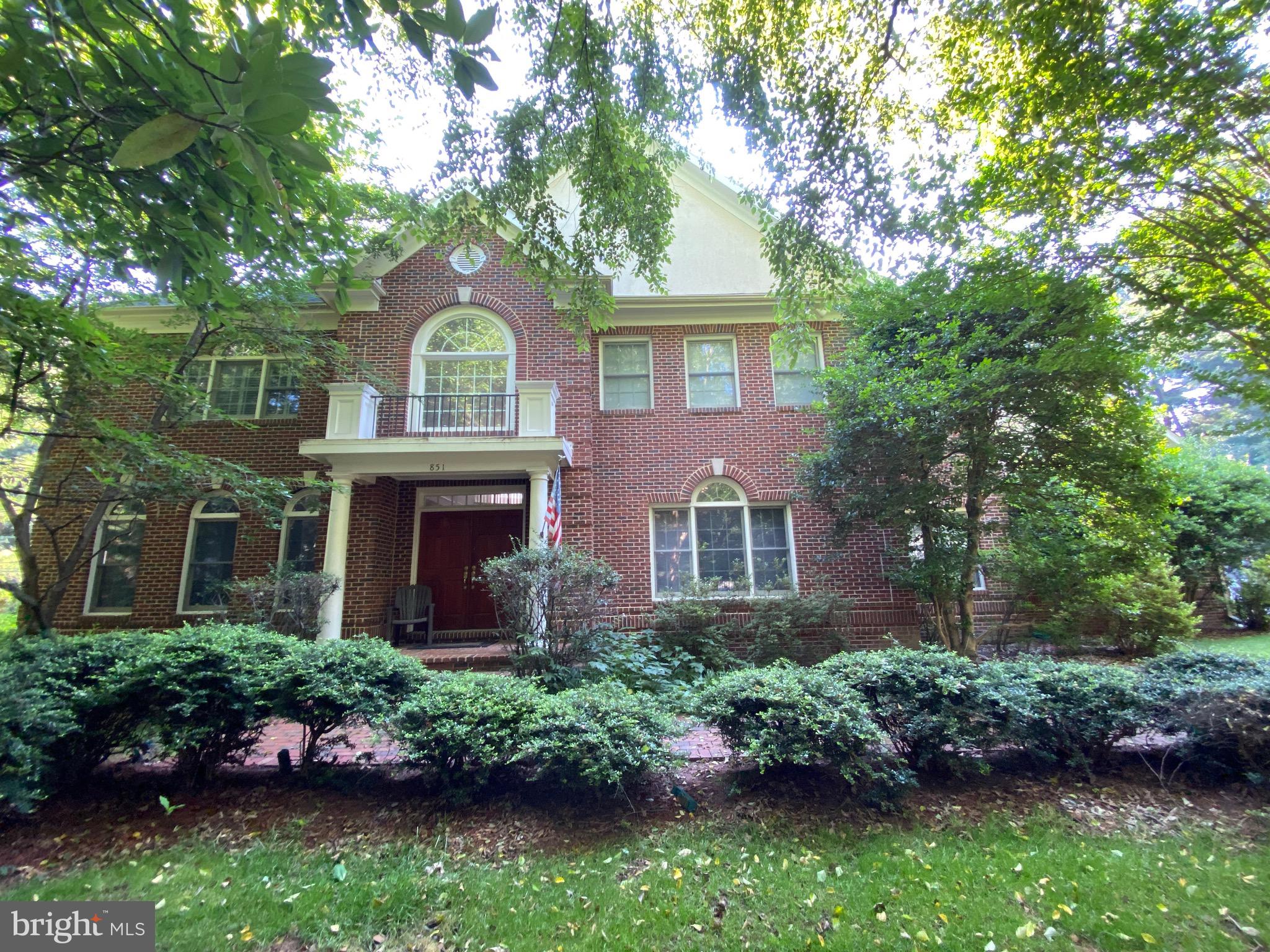 Welcome to this luxurious listing in Great Falls. Set on nearly an acre, this all brick home has it all. Newly refinished hardwood floors on main level lead into a Chef's kitchen with wolf appliances and a sub-zero refrigerator. All the appliances are stainless steel, including a brand new built-in microwave and hood. Granite countertops and lots of counter space The kitchen also features two walk-in pantries and a convenient desk area with new wine/beverage fridge. The rest of the main level is freshly painted and features beautiful crown molding. The family room contains a two level ceiling and a brick fireplace. There is also a large office with built in book shelves for all those work from home days.   The upstairs boasts 4 large bedrooms and 3 full bathrooms. The main bedroom features his and hers walk-in closets and built in shelves. The main bathroom has a jacuzzi tub as well as two separate sinks. The two other upstairs bedrooms have built in shelves.  The fully finished basement has something for everyone. There are two bedrooms and two bathrooms as well as a Media Room, exercise room, and wet bar. There is also a fireplace and lots of storage. The walk-out takes you to a large in-ground pool with hot tub and a two floor deck with lots of privacy. There is also a large yard that backs to trees. This is a rare opportunity in Great Falls! The property is located in the highly rated Langley High School pyramid and is close to shopping and commuter routes.  Come see it and move-in before the school year starts.