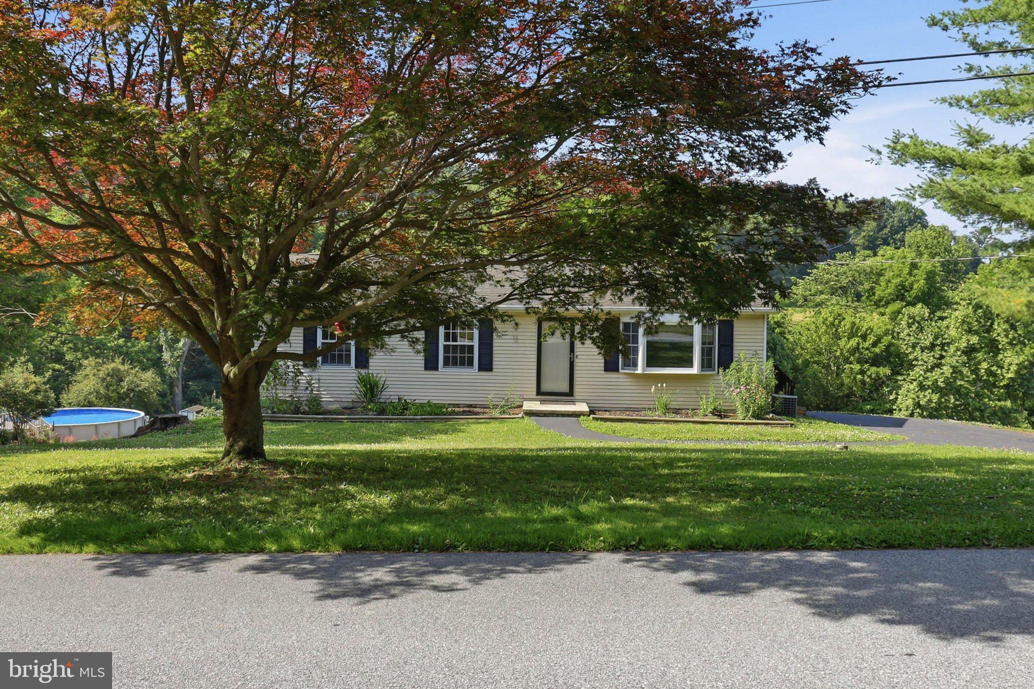 COMING SOON! Interior photos have just been uploaded, check them out! Showings begin Wednesday, 7/8. Call today to schedule your private tour. Enjoy a slice of country paradise just a short drive from Lancaster. Situated on a picturesque 0.80-acre lot in Conestoga Township within the Penn Manor School District, this move-in-ready home offers the perfect blend of peaceful living, privacy, and breathtaking Southern Lancaster County views. Designed for easy main-floor living, the home features three bedrooms, a beautifully updated full bathroom, and an updated kitchen. Abundant natural light fills the home, while nearly every room captures stunning views of the surrounding countryside. The walkout lower level adds exceptional flexibility with a spacious family room, home office, a second full bathroom, and direct access to the backyard—ideal for entertaining, hobbies, or additional living space. If you’ve been searching for privacy, scenic views, and move-in-ready condition without sacrificing convenience, this home delivers. Enjoy the tranquility of country living while remaining close to Lancaster, shopping, dining, and everyday conveniences. Contact us today to schedule your private showing before this one is gone!