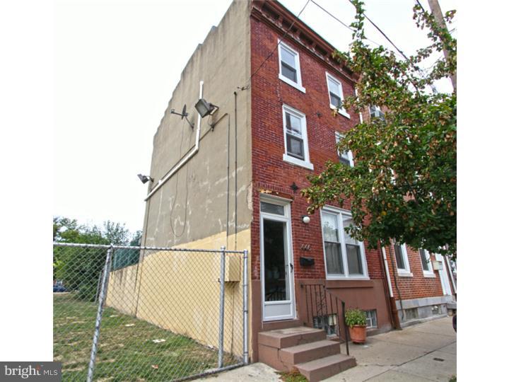 1446 N 4th St is only a few short blocks form Northern Liberties. This 3 story charming brick front row home has 4 large bedrooms, 1 bath, has some original features and many modern upgrades. Original features include original random wide plank flooring on the upper level bedrooms, and an original storage nook on the 3rd floor. Enter in through the open living and dining room. The 1st floor has hard wood floors, professionally painted and with views straight through to the kitchen. The kitchen is renovated with butcher block counters, flat panel cabinetry with pantry, built in gas range, refrigerator microwave and dishwasher. There is a breakfast bar and peek through window that oversees the living and dining room. The rear yard ends at the wall but the bonus exterior space is being used and maintained by this owner (owner of bonus space is unknown). The 2nd floor has a updated bath with large storage vanity, 2 bedroom on the 2nd and 2 bedrooms on the 3rd floor. This home has radiator heat but it also includes a wall mounted high efficiency heating and cooling system for each room. This allows climate control in all living spaces. Basement is full and unfinished with laundry hook up.  Property has opportunity for updating to maximize your investment and sweat-equity with your own personal finishing touches. Parking is a breeze on this wide block.  In immediate proximity to public transportation and to all the amazing restaurants and coffee shops that South Kensington and Northern Liberties has to offer. Seller is motivated ! We welcome your showings.  Easy to show - Make your appointment today !