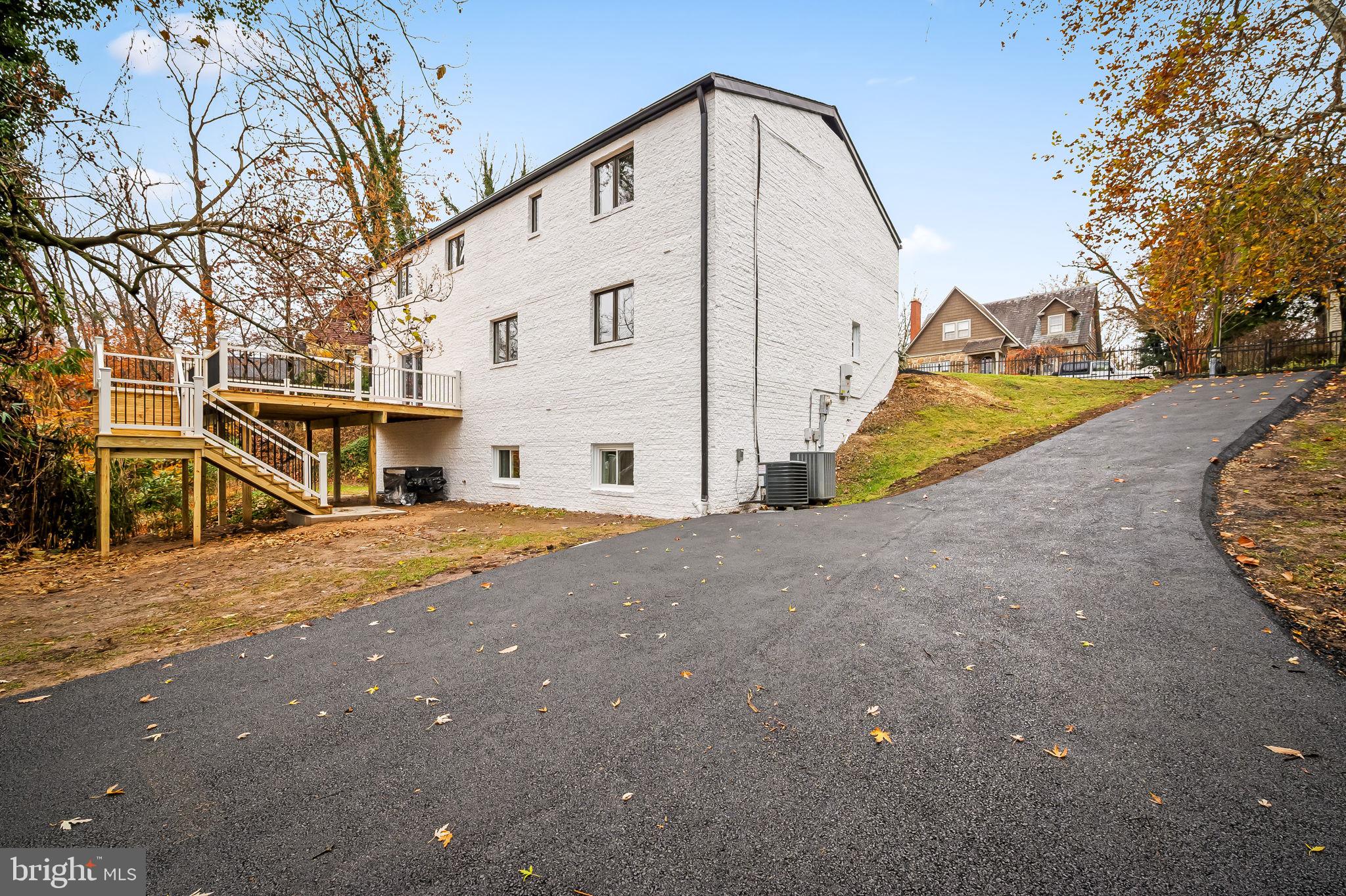 This beautiful rancher has over 3900 square footages for unlimited possibilities!!! Fully renovated with 6 bedrooms and 5 full baths in the prime Towson location. State of the art kitchen with 42" wooden cabinets, quartz countertop, stainless-steel appliances and solar panels. Open floor concept. Three family rooms with recess lighting throughout, fireplace and sliding door to an oversized deck. New baths with masterful tile work. New washer and dryer, new windows, new AC/Furnace units, new roof, new driveway and a lot more extras. Must See!!! Definitely one of a kind!!!