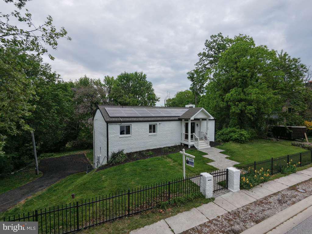 This beautiful rancher has over 3900 square footages for unlimited possibilities!!! Fully renovated with 6 bedrooms and 5 full baths in the prime Towson location. State of the art kitchen with 42" wooden cabinets, quartz countertop, stainless-steel appliances and solar panels. Open floor concept. Three family rooms with recess lighting throughout, fireplace and sliding door to an oversized deck. New baths with masterful tile work. New washer and dryer, new windows, new AC/Furnace units, new roof, new driveway and a lot more extras. Must See!!! Definitely one of a kind!!!