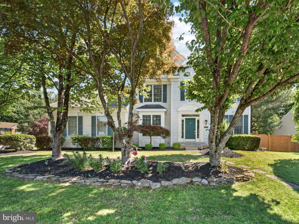 Gorgeous & Sophisticated 3-Level Detached Home in a Beautiful Community

This stunning single-family home offers the perfect blend of elegance, comfort, and modern upgrades. Featuring 5 spacious bedrooms, 3.5 bathrooms, and a dedicated office space on main level, this home is designed for both everyday living and entertaining.

Step inside to find hardwood flooring throughout and a thoughtfully designed layout. The recently remodeled kitchen boasts ceramic tile floors, stainless steel appliances, quartz countertops, a stylish glass backsplash, soft-close cabinetry and a bright breakfast area.

Relax in the inviting family room with a cozy fireplace and recessed lighting, or retreat to the luxurious primary suite, complete with a sitting area and a fully remodeled bathroom featuring porcelain tile walls and floors, double vanity, skylight, soaking tub, and separate shower.

Additional highlights include:

2021 Remodeled hallway bathroom with ceramic floors, walk- in shower, floor-to-ceiling custom tile  and updated vanity.
Fully finished basement with full bath, ceramic and carpet flooring, ample storage space and an additional office/den.
Ceiling fans in all bedrooms. 
Radon System Installed 2017.
Newer Roof,  Siding, Gutters, and Copper Bay Window installed in 2017. Newer  Water Heater. 
Spacious fully fenced backyard featuring a Beautiful patio, Lower-Level Trex deck built in 2021,  and a Wood Gazebo—perfect for outdoor entertaining.
 Corner lot with a 2-car garage.
Ideally located close to schools, shopping, and transportation, this home truly has it all.