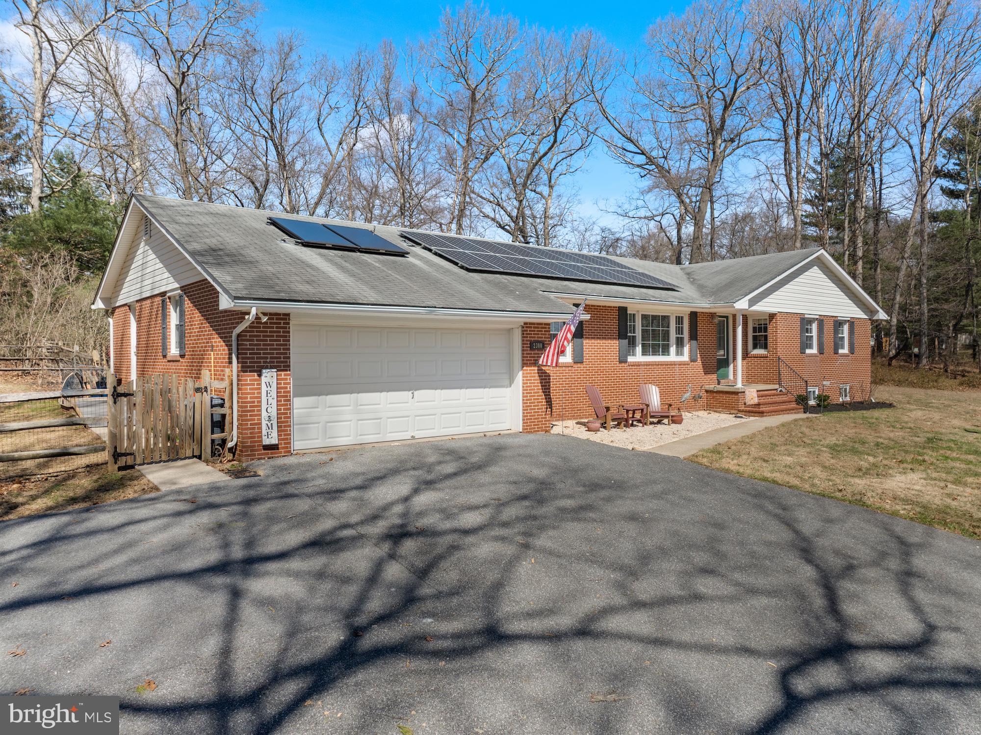 Welcome to 2300 Pin Oak Drive—this brick-front rancher offers the perfect blend of comfort, character, and everyday convenience.
Set on a spacious, scenic lot with no HOA, this home delivers a peaceful, tucked-away feel while still being just minutes from major commuter routes—offering the best of both worlds.
Inside, wide-plank Brazilian hardwood floors lead into a warm and inviting family room, highlighted by a distinctive corner brick wood-burning fireplace with a cast iron insert, creating a cozy and efficient focal point. The kitchen is both functional and stylish, featuring stainless steel appliances, including an induction stove, generous counter space, and easy access to an updated laundry room with added pantry storage—right where you need it most.
The main-level primary suite is a comfortable retreat, complete with a walk-in closet and private bath with double sinks, a soaking tub, and a separate shower. Additional bedrooms offer flexible spaces for guests, a home office, or hobbies.
The finished lower level adds valuable living space with room to spread out, entertain, and plenty of storage throughout.
Step outside to enjoy the fully fenced backyard, which includes a separate enclosed area ideal for pets, along with a 16x18 stamped concrete patio—perfect for gatherings or unwinding at the end of the day. A two-car garage and additional parking with electric hookup provide even more convenience.
Adding to the home’s value and efficiency, the solar panels are fully owned, not leased.
A perfect blend of space, functionality, and location—don’t let it slip away!!!