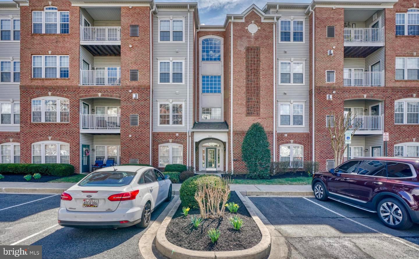 Beautiful second-floor unit featuring a private rear balcony and an open kitchen with a separate eat-in area, in addition to formal living and dining rooms. Spacious primary suite offers a sitting area and private bath, while the secondary bedroom is thoughtfully located on the opposite side of the unit with access to a full bath for added privacy.

Enjoy a low-maintenance lifestyle with community amenities including trash service, snow removal, lawn care, walking trails, and exterior building maintenance. Residents also enjoy access to indoor and outdoor pools, a clubhouse with fitness center, billiards room, library, card room, and many additional social and recreational amenities.