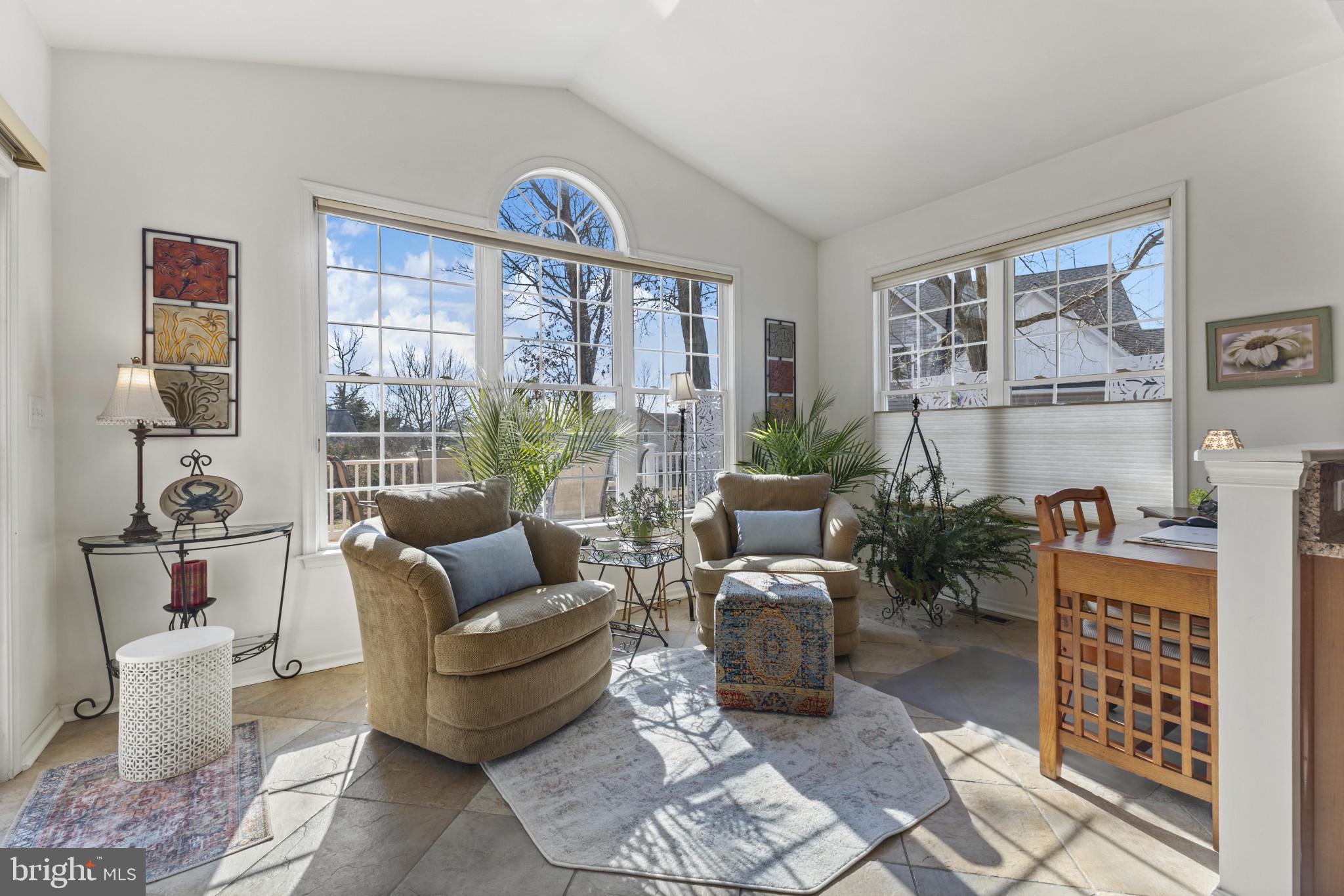 Price improvement! Motivated sellers. This custom built home offers the perfect opportunity to live just minutes away from the Chesapeake Bay Bridge and Route 50, offering partial water views and a layout designed for both everyday living and effortless entertaining. 

The main level features 12 foot ceilings and oversized 6 foot windows that create bright, open living spaces. A vaulted morning room transitions seamlessly into a sunroom, providing flexible space for dining, relaxing, or working from home. The gourmet eat-in kitchen offers granite countertops, a substantial center island, pantry, and an open-concept design that opens into the family room and sunroom. The primary suite is generously sized, featuring a tray ceiling and a well-designed bath with custom tile shower and double vanity. The remaining four bedrooms share two jack-and-jill style bathrooms offering convenience for family and guests. 

Outdoor living is equally appealing, with an 800-square-foot wraparound deck ideal for entertaining. The property also offers space for a potential in-ground pool (buyer to verify with Planning & Zoning). Additional features include custom hardwood and tile flooring run throughout, tailored Roman blinds and wood shutters, new HVAC system, finished garage, and dedicated laundry room with new washer, dryer, and utility sink. A rare 1,820-square-foot crawl space with 4-foot ceilings, finished concrete floor, and indoor access provides plenty of additional storage. 

Built by local builder Lacrosse Homes with numerous upgrades, this well-maintained home offers immediate value in one of the most popular areas on the Eastern Shore - all with no HOA. Schedule your tour today.