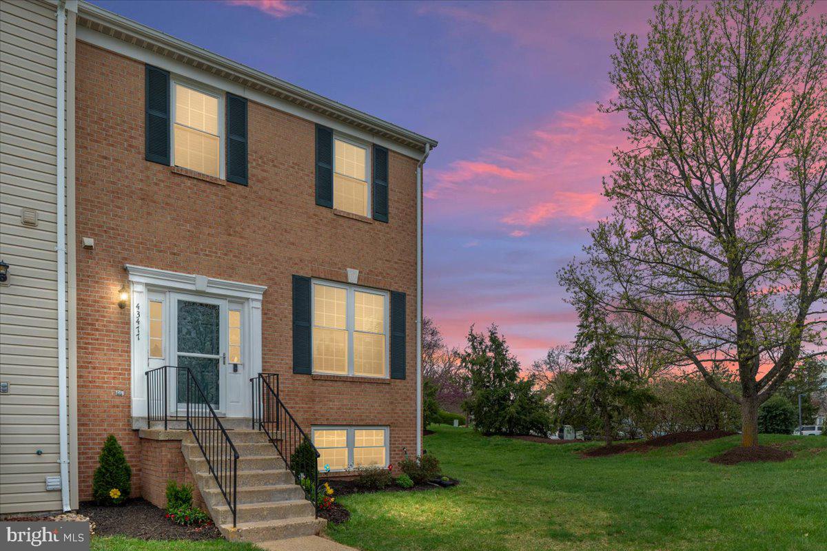 Welcome to your future home!. This lovely End Brick Front End Unit home located in the heart of Ashburn Farm Community. This exceptional corner townhome is situated on a premium lot with no homes directly on the back or in the front, this residence provides a peaceful retreat offering unparalleled privacy and serene green views. The home offers 3 fully finished levels, as you step through the front door, you are greeted by a bright and natural light-filled interior. Main level has Hardwood Floors, Powder room with newer flooring and Cabinet. Incredible Kitchen with large table space area and breakfast bar. This home boasts three generously sized bedrooms, each designed with comfort in mind. The Master Bedroom with Vaulted Ceilings and Ceiling Fan, Walk in Closet, Master bath has been updated with newer floor, Shower and Whirlpool tub with jets. Two additional bedrooms and one full bathroom round out the upper level ensuring convenience for all. The Lower-Level Recreation Room has a Carpet, wood burning fireplace, custom built in cabinets and desk area, also the full sizes screen, HD projector and round sound system will stay. Full Bath with newer tile and vanity. Storage underneath stairs.
 The MUST–SEE home has been enhanced over the years including Kitchen has Quartzite Counters and complementing Back Splash. Deck freshly stained (2025), Fence (2021), Sliding door (2021), Dishwasher and Refrigerator have been replaced (2020), All BRAND-NEW WINDOWS (2022) through the ENTIRE home to allow for plenty of natural light. Large Laundry Room with full size washer & dryer (2016) and Utility Sink and Work Room. HVAC was replaced in 2012; Humidifier replaced 2020; Roof replaced 2015. Walk to shopping and Windmill Community Pool; Bile Path that links to W&OD trails and Dinosaur Park is a short walk on bike path. There is a Park & Ride at Dulles Park & Ride within 5 miles of home. Move-in ready!