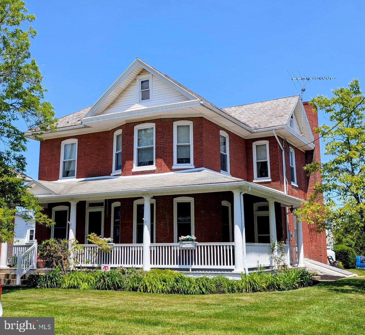 This  property is being offered at a live on site Public Auction on Wednesday, August 19, 2026 at Noon.  This listed price is not the sale price and property may sell for higher or lower than this list priced at public auction subject to seller confirmation of price.  Auction Terms:  10% down payment day of auction, balance of purchase price by September 30, 2026, Buyer pays all realty transfer taxes, property taxes prorated at settlement, property sold in "as is" condition.  Property consists of a well built and kept 2 story brick Victorian home on a .36 acre level, landscaped lot situated on one of Gap's prettiest streets.  The main floor contains a foyer area,  formal living and dining rooms with pocket door divider, updated oak island kitchen, family room addition w/a brick Fireplace w/propane insert, half bath and laundry room.  The upper level contains 4 bedrooms and a full bath.  There is floored attic storage with stairway access.  The full basement  has an "L" shaped rec room and utility and storage areas with an outside entrance.  There is a 7'x45' wraparound front porch. Updates include insulated replacement windows, 200amp electric service and more.  There is a detached 2 car garage and paved driveway.  Great location with easy access to major routes and shopping.  Seriously for sale - Don't Miss It!!!