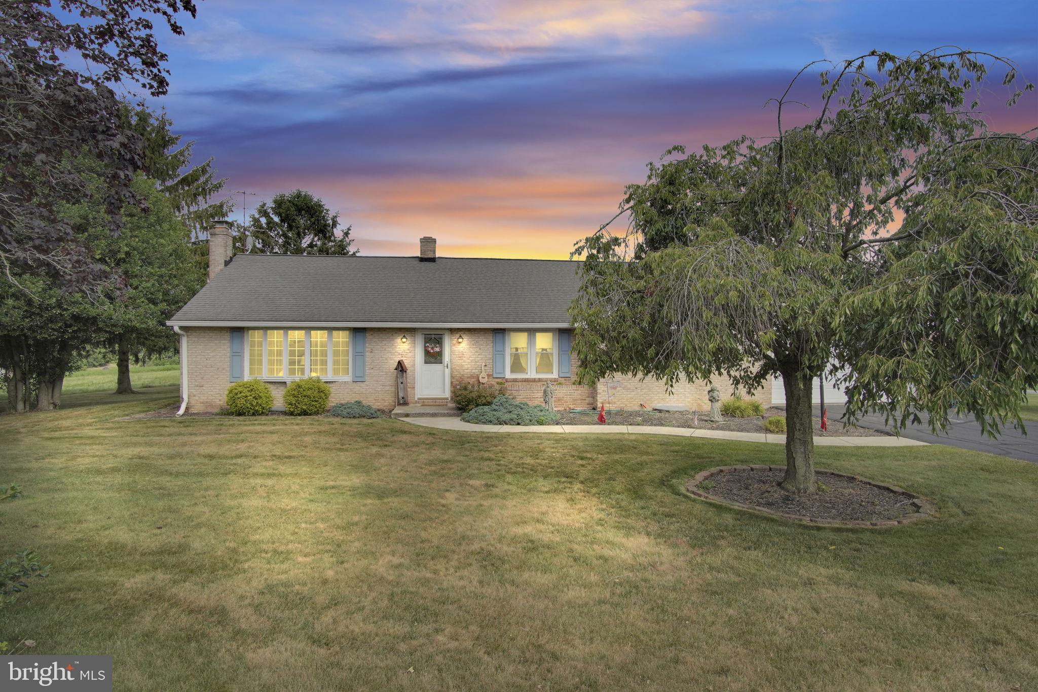 Nestled in the serene county of North Codorus, this charming ranch-style home offers a perfect blend of comfort and elegance, ideal for those seeking a tranquil lifestyle. Built in 1962, this well-maintained residence boasts a timeless brick exterior that exudes warmth and character. Step inside to discover a thoughtfully designed interior that welcomes you with rich hardwood floors creating an inviting atmosphere throughout. The spacious family room, conveniently located off the kitchen, is perfect for gatherings. The dining area flows seamlessly from the kitchen, making entertaining a delight. This home features three generously sized bedrooms, including an entry-level bedroom that provides ease of access. The master suite is enhanced by a walk-in closet, offering ample storage space. The convenience of a dedicated laundry area in the basement adds to the home's functionality. Also, in the basement you will find something most homes don't have these days! A cold cellar perfect for storing freshly canned items and potatoes. There is also a stove top in the basement for convivence if you enjoy canning your own fruits and veggies. Outside, the expansive 0.67-acre lot is beautifully landscaped, providing a serene backdrop for outdoor activities or quiet moments of reflection. Enjoy the fresh air on the screened patio, an ideal spot for morning coffee or evening gatherings. The property also includes a shed for additional storage, ensuring that your outdoor space remains organized and clutter-free. Parking is a breeze with a spacious attached garage that accommodates two vehicles, along with additional driveway space for guests. Along the side of the house there is also a spot to back a camper/rv onto the set of bricks located on the ground. A receptacle is conveniently placed on the side of the home for your electrical needs. The Garage features inside access, making it easy to bring in groceries or other essentials. This home is not just a residence; it's a lifestyle. With its blend of comfort, style, and functionality, it offers a unique opportunity to create lasting memories in a peaceful setting. Experience the charm of North Codorus Township and make this delightful property your own.