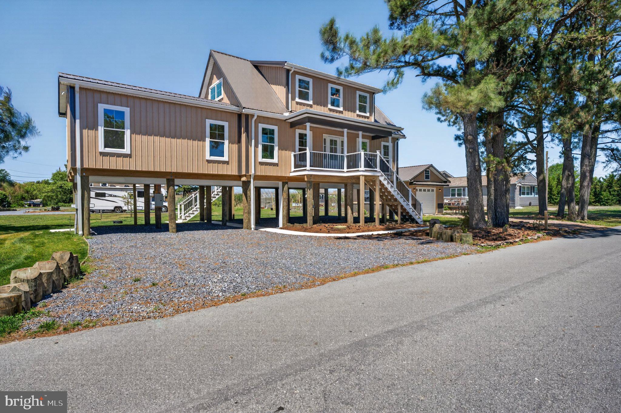 Your own paradise is waiting for you here in a hidden beach on the Delaware Bay!
Kitts Hummock Beach is a quiet and peaceful Bay community with Picturesque and Captivating scenic views of Wetlands, Conservation Areas and Nature trails. Close to Dover for shopping and conveniences.
 Delaware’s Ocean beaches a hour+ away.
This Amish built custom home is quality construction. When you walk in the Beautiful Hardwood floors are throughout. Neutral color palette. Lots of Natural lighting. Cozy living room.  Great Kitchen with Breakfast Bar. Stainless Steel Appliances,  Gas range, microwave, dishwasher and refrigerator with ice maker.
First level has a main bedroom with full bathroom. Laundry room.  Powder room.
2nd level has 2 bedrooms  that over looks  the wetlands.   1 full bath.
Ceiling fans , central air,
 Energy star heating system ( propane) and
 Tankless hot water system.
Pre wired for a cargo lift/ elevator.
Note: 51 N Bay lot with Garage next to this property is not included but is an option to purchase.