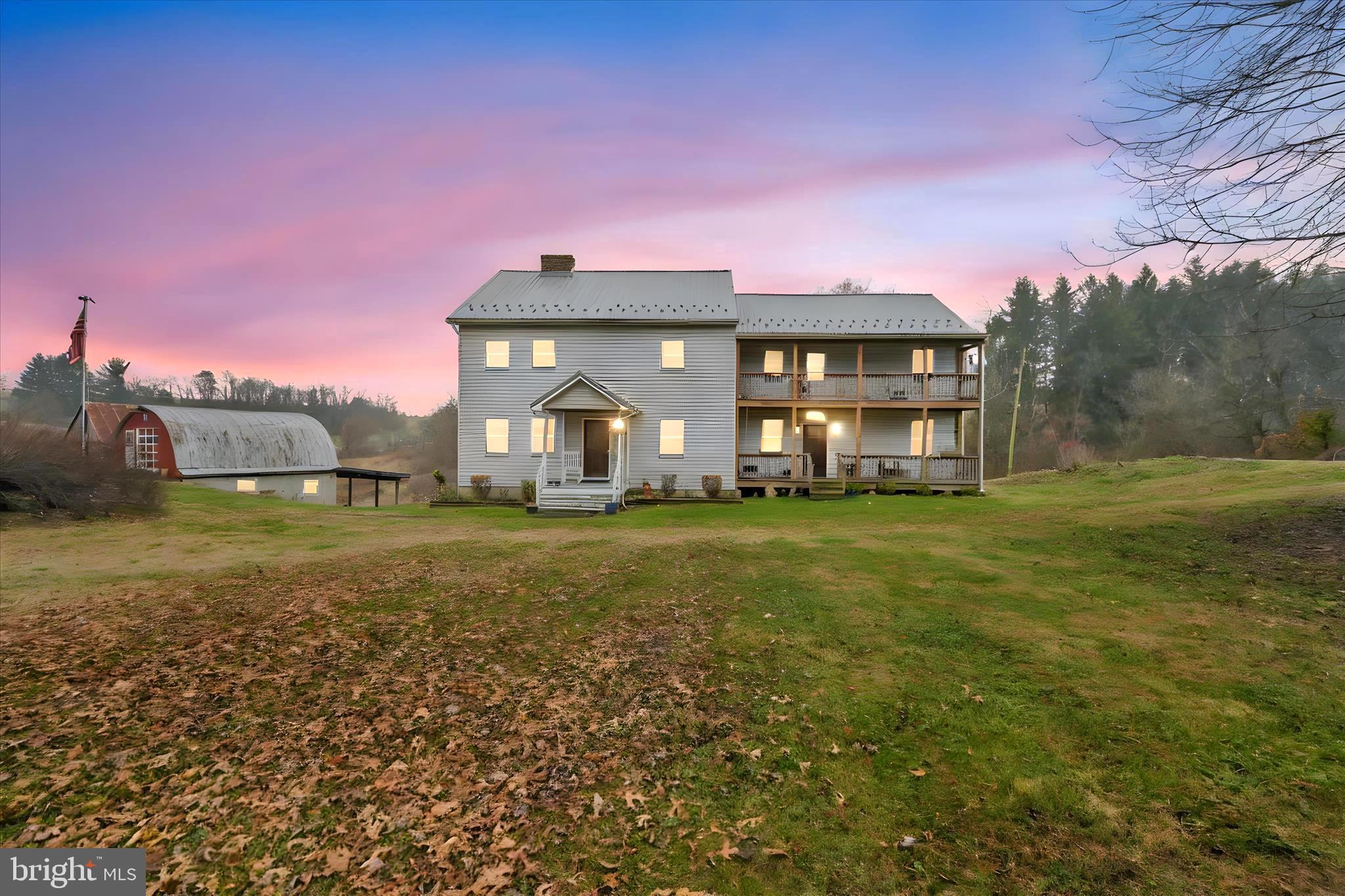 Dandelion Farm - your 69 acre Equestrian Dream Home. The former Dandelion Farm Equestrian Center sits on 69 acres and centers around a beautiful 4016 sq ft farmhouse that dates all the way back to 1850. It has been lovingly updated over the years keeping all the original charm  while giving you the modern comforts you need. When you walk through the front door you will immediately see where the old meets the new. The foyer features repurposed wood flooring that was salvaged from the second floor. The old west wing is now an enormous living room with exposed wall beams. This sitting room  flanks the  foyer to the left upon entry and features a working brick raised hearth fireplace. The floors have the original wide plank flooring. The  large and updated kitchen spans the rear of the west side of the home and  features modern stainless steel appliances, plenty of cabinets  and counter space.  The dining area also has a coal stove to help with supplemental heat.  There is also a half bath on the first floor. Upstairs there are 5 BEDROOMS AND 4 FULL BATHS ! The primary bedroom has an attached bathroom with newly installed shower and LVP flooring.  There is a 2nd bedroom that also features an attached   full bath and then 2 hallway bathrooms. And if you need more space the third floor has been partially finished and could be another bedroom, studio or office. There is also a room that has plumbing roughed -in but not ever finished. Now for the Farm :  The Main barn has 18 stalls, a tack room, a wash rack a half bath and a 100 x60 ft indoor training arena. There is also an outdoor training arena across the road, a second smaller barn ( both barns have water )  a 2 story machine shop, a tractor shed a bank barn and a milk house.  The LAND :  The pastures are set up with a frost -free water pumping system for irrigation and the electrical fencing is installed and just waiting to be activated. There is so much more here to see.  Call for an appointment to see this beautiful farm for yourself !