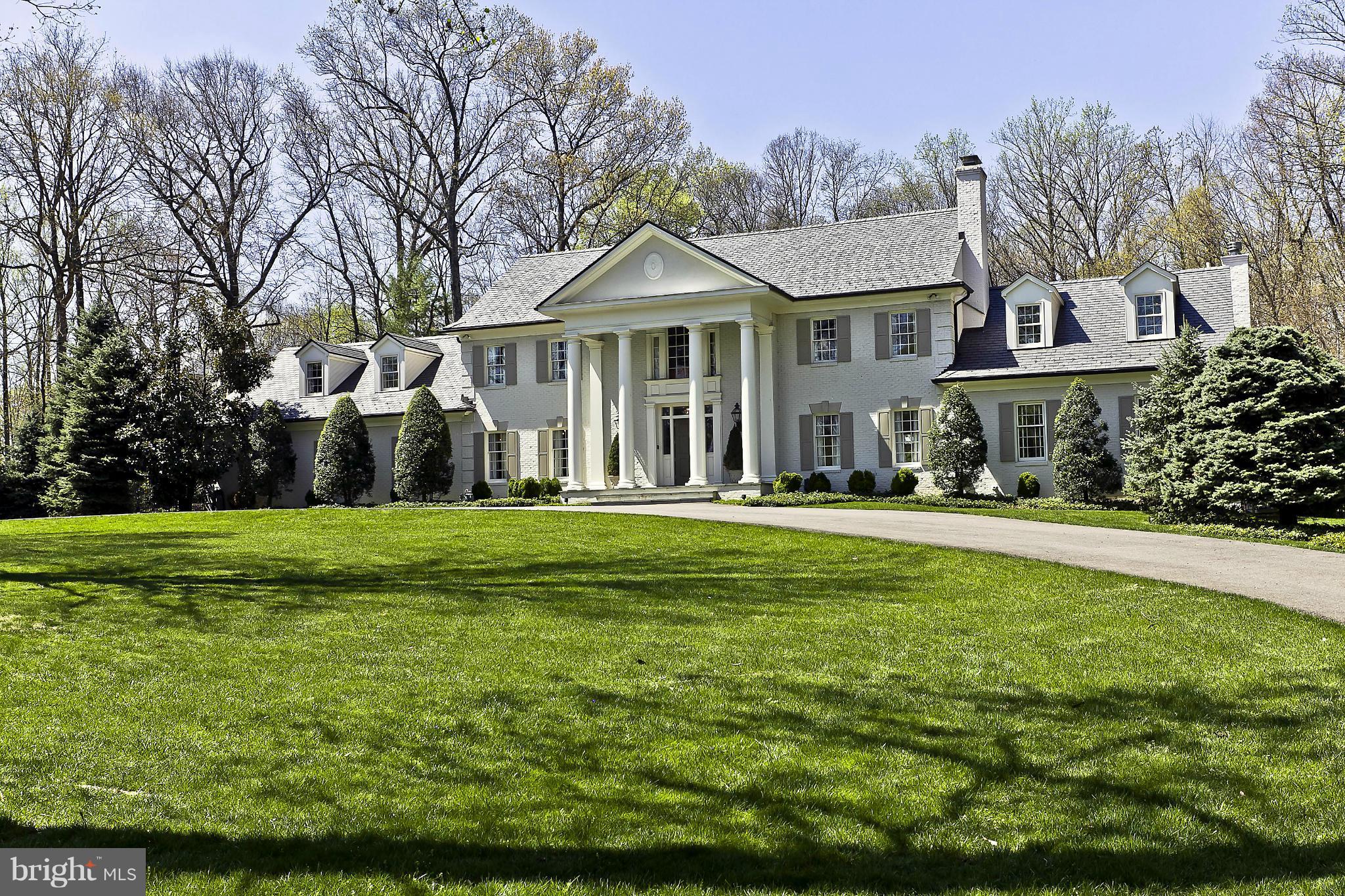 INCREDIBLE 10% PRICE REDUCTION! Classic Georgian Colonial expanded and fully renovated with meticulous care and attention to detail. Expansive main lvl w/ formal entertaining rms, including Grand Salon, DR, & marble foyer. Kitch w/ brk rm, wood-paneled library, Fam Rm w/ FP. 5BR/5F/2HBAS w/ enormous Mstr Ste. INCREDIBLE GROUNDS ON 2+ ACRES w/ heated pool, flagstone terr, loggia.