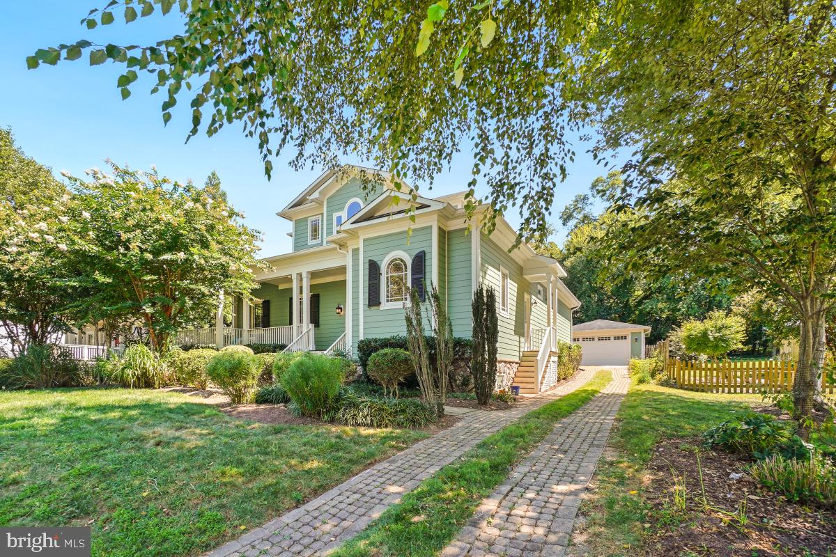 Open Saturday 2-4PM & Sunday 12-2PM. 

Offer Deadline Tuesday 9/9 at 10AM.

Welcome home to 217 Talahi Rd SE! This fabulous custom home was built in 2006 and sits on nearly a third of an acre in the heart of the Town of Vienna. With three beautifully finished levels, the home has great curb appeal with mature landscaping and a lovely front porch.

As you step through the arched doors, a dramatic two-story exposed foyer creates a stunning first impression with views all the way to the lush green backyard. To the right, a large office faces the front yard and provides the perfect space to work from home.

The main level features an open layout filled with natural light, elegant crown molding in the family room, and a gas fireplace in the living space. The kitchen is a chef’s delight, offering a Dacor oven and range, built-in KitchenAid microwave and wall oven, KitchenAid refrigerator/freezer, Miele dishwasher, and a Shaw’s Original apron sink. The kitchen flows seamlessly into the dining area and family room with gorgeous custom built-ins. For convenience, a powder room is tucked just outside the living area.

Also on the main level is the impressive primary suite, offering two large walk-in closets, a gas fireplace, and a private entry to the serene backyard. The spacious en-suite bath includes dual sinks, a soaking tub, a separate shower, and a water closet.

Upstairs, a large reading nook overlooks the entry and includes built-in shelves—ideal for creating your own personal library. Two additional bedrooms, each with en-suite baths and large closets, complete this level.

The lower level is designed for entertaining, featuring high ceilings, a private theater with a projector and in-wall speakers, a kitchenette with wine refrigerator, ice maker, and dishwasher, and a spacious living area. A large gym, fourth bedroom with a massive walk-in closet, and full bath provide ample space for recreation and guests.

Step outside to enjoy the lush backyard with a patio and pergola, perfect for morning coffee or evening get-togethers. The flat, fully fenced yard is ideal for pets and play, while a detached 2-car garage and long driveway provide abundant parking and storage.

Additional features include: 21 panel solar array for energy efficiency, no carpet throughout, tray ceilings, a walkout basement to the backyard, high ceilings on every level, and extensive storage throughout the home.

Location is everything: this property is ideally situated within walking distance to the W&OD Trail, Vienna Community Center, Patrick Henry Library, Whole Foods, restaurants, and shops. It’s also in a top-rated school district with easy access to Metro, local parks, Route 123, I-66, and I-495.

All measurements are estimates.