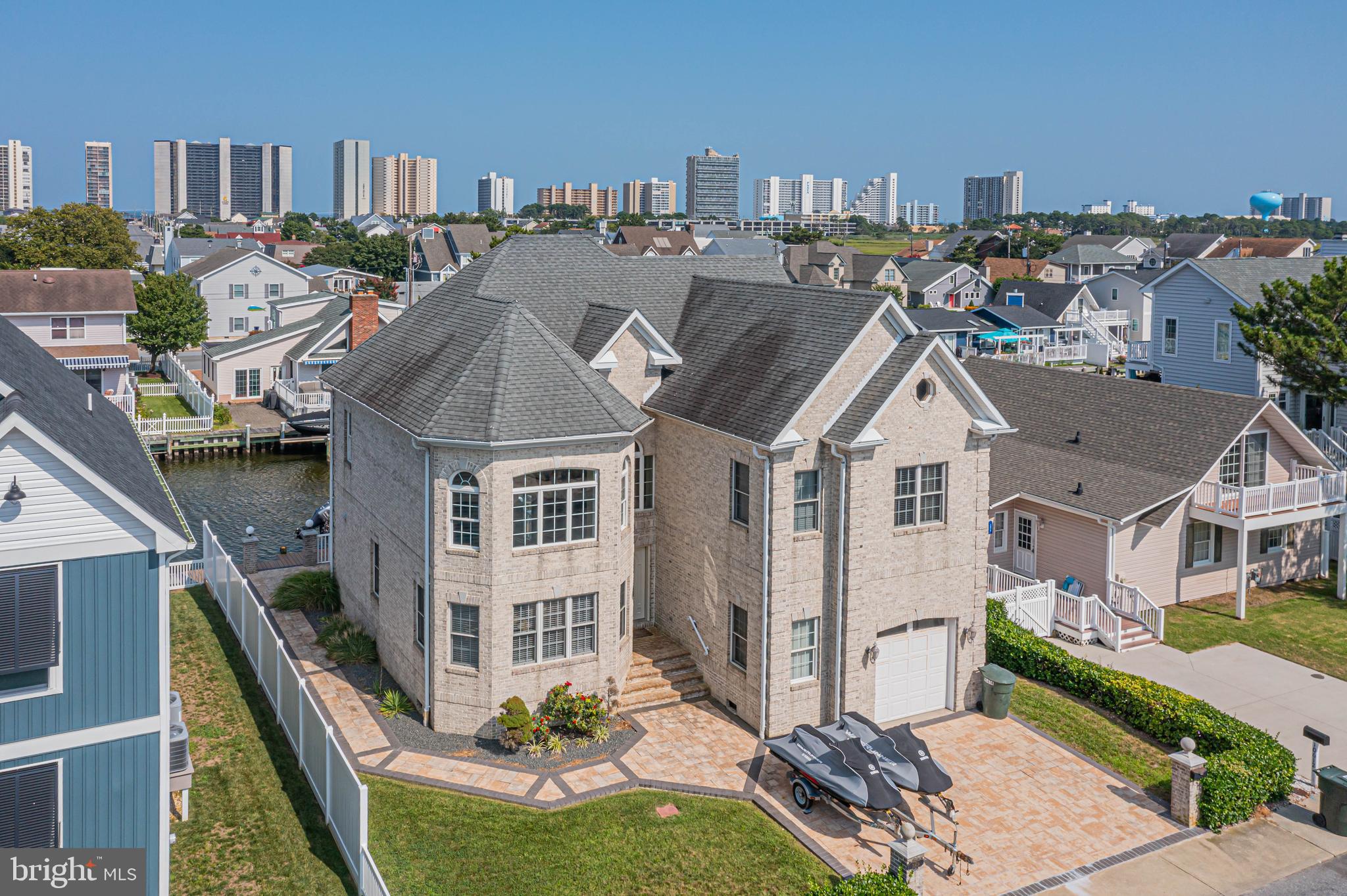 Welcome to this stunning masonry waterfront home located on sought-after Point Lookout Road in the Caine Keys II Ext community. Enjoy breathtaking views and direct access to Assawoman Bay, complete with a boat lift, jet ski lift, and updated bulkheading for your watercraft. This well-constructed, beautifully maintained home is sold fully furnished and move-in ready.
Whether you’re relaxing indoors or entertaining outdoors, you’ll love the bright coastal décor and thoughtful layout. Perfectly situated close to Ocean City’s famous beach, popular restaurants, and vibrant bars, this home offers the ultimate coastal lifestyle.