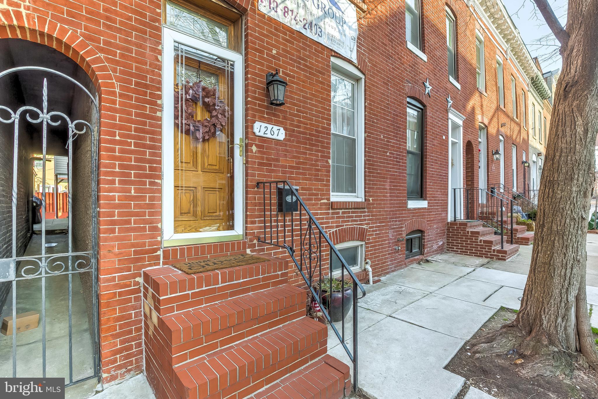 STUNNING 15 FT WIDE ROW HOME LOCATED IN THE HEART OF FEDERAL HILL WITH OFF STREET PARKING PAD. INCREDIBLE BLOCK AND EXTREMELY SOUGHT AFTER LOCATION. GLISTENING HARDWOODS CASCADE THROUGHOUT. ENJOY WHITE CABINETRY, FRESH PAINT, AND GORGEOUS COUNTERTOPS. OVERSIZED LOT AND GIGANTIC FLOOR PLAN. TONS OF NATURAL LIGHT. HIGH CEILINGS. TONS OF STORAGE. WALK-IN SHOWERS. WALK-IN CLOSETS. SPACIOUS 3 BEDROOMS WITH 2 FULL BATHROOMS. 3 BEDROOMS ABOVE GRADE. DEN LOCATED ON THE SECOND LEVEL. EXPANSIVE PRIVATE SCREENED IN PORCH/DECK - GREAT FOR ENTERTAINING. CLOSE PROXIMITY TO RETAIL SHOPPING, LOCAL DINING, PATTERSON PARK, AND ALL MAJOR HIGHWAYS. SCHEDULE A PRIVATE TOUR TODAY!