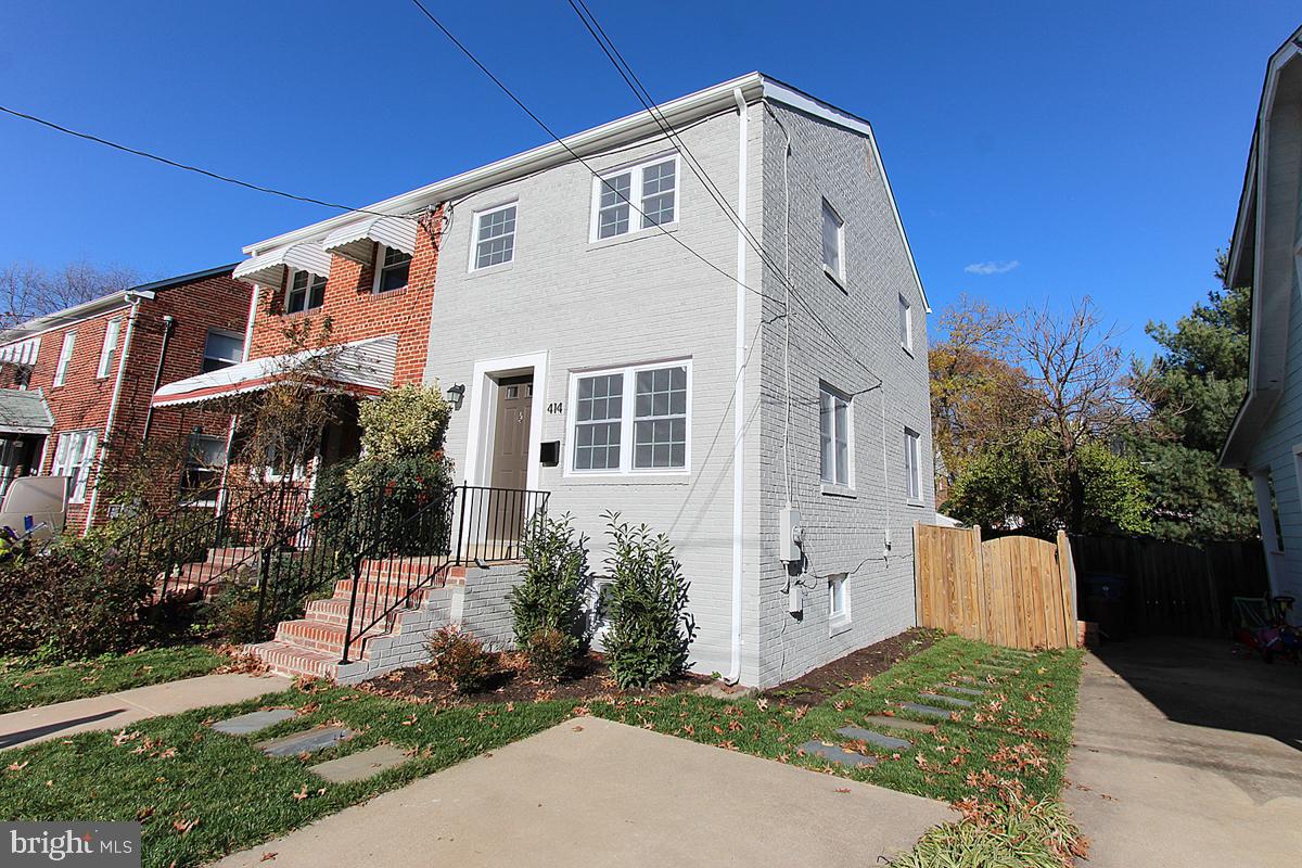 Fanastic Value!  This beautiful Del Ray end unit townhome is conveniently located to blue and yellow line metro, blocks to the shops along "The Avenue", and so close to Old Town Alexandria!  Enjoy three finished levels, hardwood floors, high-end stainless appliances, granite counters, energy efficient windows/doors, and its private fully-fenced yard and off street parking! Brand new washer/dryer! This delightful end-unit townhouse offers a perfect blend of modern comfort and classic appeal. With two spacious bedrooms and two full bathrooms, this residence is ideal for those looking to enjoy a cozy yet functional living space.

As you step inside, you'll be greeted by an inviting living area that flows seamlessly into the dining space, creating an open and airy atmosphere perfect for both relaxation and entertaining. The kitchen is designed for efficiency, boasting ample storage and counter space, ready for your culinary adventures. Features included granite counters, a huge kitchen island, and a door leading to the decks, perfect for entertaining. 

Upstairs, you'll find two generously sized bedrooms, each providing a tranquil retreat from the hustle and bustle of daily life. The bathrooms are thoughtfully designed, ensuring comfort and convenience with tasteful finishes. The area downstairs is another living space and has a large laundry and walk up exit to the fully-fenced backyard. 

One of the standout features of this property is the included parking, offering the ease and security of having your vehicle steps away from your front door. The outdoor space offers opportunities for gardening or simply unwinding with a good book on a pleasant day.

Located in a vibrant community, this townhouse is just moments away from local shops, dining, and entertainment options, ensuring you have everything you need within reach. Don't miss your chance to make 414 E Custis Ave your new home. Experience the unique charm and vibrant lifestyle that Del Ray has to offer.  Easy access to metro, Old Town, and all the major arteries of travel.  Location, location!