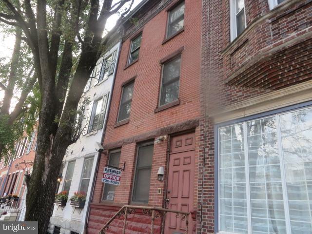 Three story office building located just off of 17th and Pine Street and close to Rittenhouse Square. Approximately 2400 sq ft. of office space on 3 floors. 1st floor reception area, common office space plus rear private office with bathroom and rear patio. 2nd floor conference room,  rear private office, powder room, plus additional office space. Third floor has 3 private offices, common office space plus powder room. Attic allow for plenty of storage space . Full basement. Three zone heating and central air. Parking lot directly across from office or possible monthly parking space available.