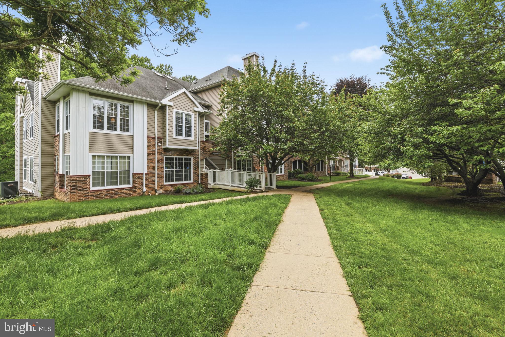 Beautiful 2nd floor condo with no unit above, offering 1 bedroom, 1 full bath, and a versatile den that could easily be converted into a second bedroom. Walk up one flight of stairs and enter through the storm door into a bright, open floor plan featuring 9-ft ceilings throughout, vaulted ceilings in the living room, and new LVP flooring throughout. The foyer entrance opens to the kitchen and laundry area to the right, while a hallway to the left leads to the spacious primary bedroom and full bath. Straight ahead, you’ll find the dining room and living room, with the den conveniently located just off the living area.
The kitchen opens to the dining room, creating a great flow for everyday living and entertaining. The cozy living room features a pellet stove for added comfort, warmth, and energy efficiency. The primary bedroom includes a new ceiling fan, a walk-in closet, and double windows for plenty of natural light. The den offers double and triple window sets along with a large storage closet, making it ideal for a home office, guest space, or potential second bedroom. The hall bath includes a tub/shower combo with newer sliding glass doors and a single vanity. 
The unit is located just steps away from the pool and a short walk to the club house/fitness center. 
Additional updates include a newer HVAC system, a newer washer and dryer, a garbage disposal, and replacement windows. All windows are fitted with 2-inch white blinds. 
Amenities include a fitness center, club house, and an outdoor pool! Condo fees include water, sewer, trash service, fitness center, and the pool, adding even more value to this move-in-ready home.  Schedule your showing today!